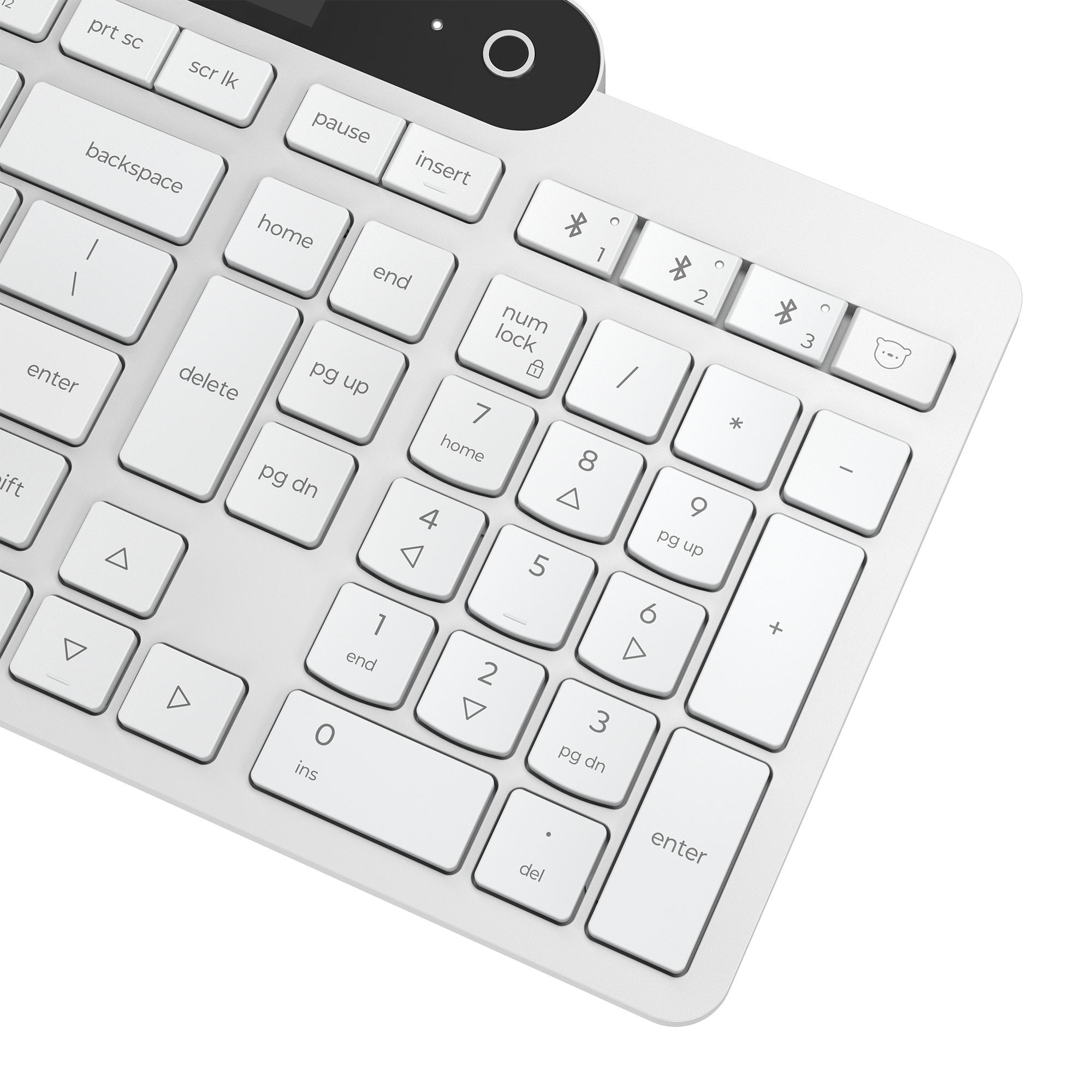 Teclado de computadora moderno y blanco con teclado numérico y teclas Bluetooth sobre fondo negro.
