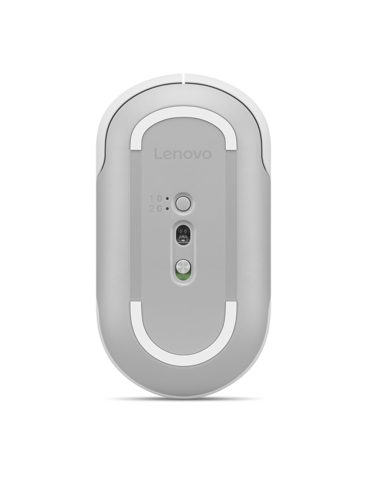 La parte inferior de un ratón de ordenador Lenovo blanco con sensores, un botón Bluetooth y almohadillas sobre fondo negro.