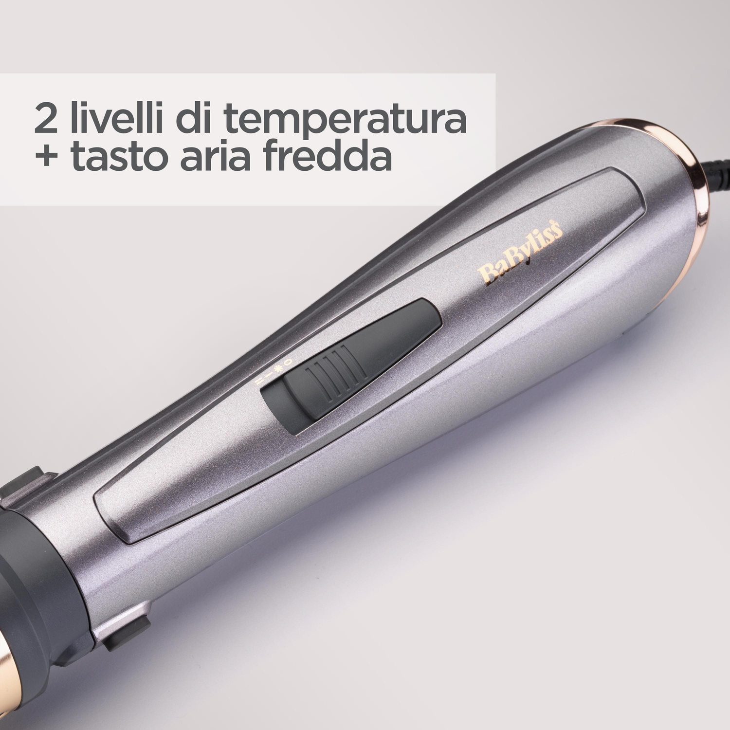 Manico per asciugacapelli Babyliss grigio con interruttore e testo in alto.