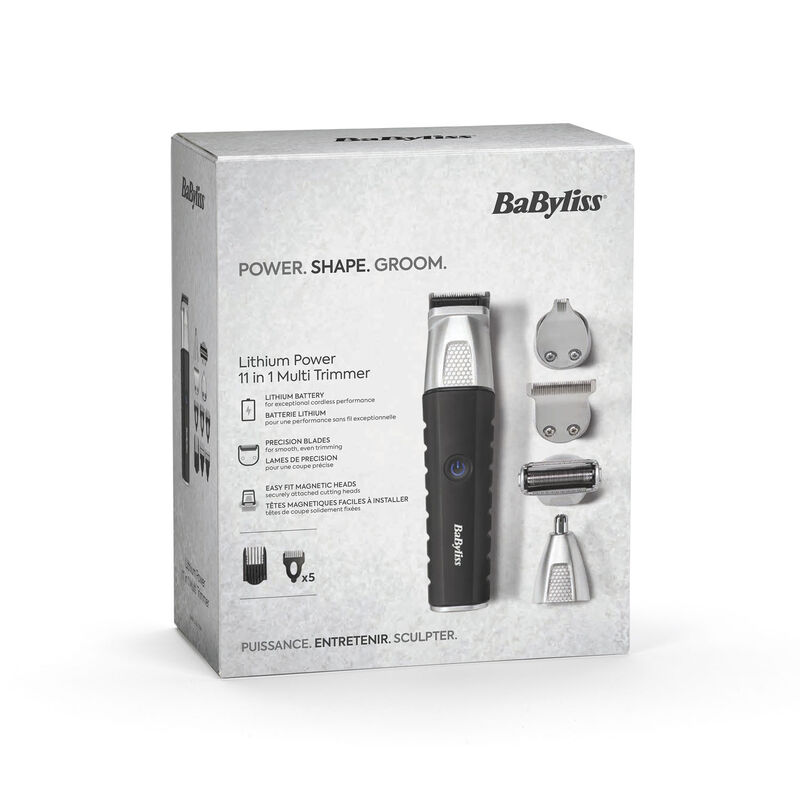 Una caja de multi-recortadora BaByliss de 11 en 1 con el dispositivo y accesorios.