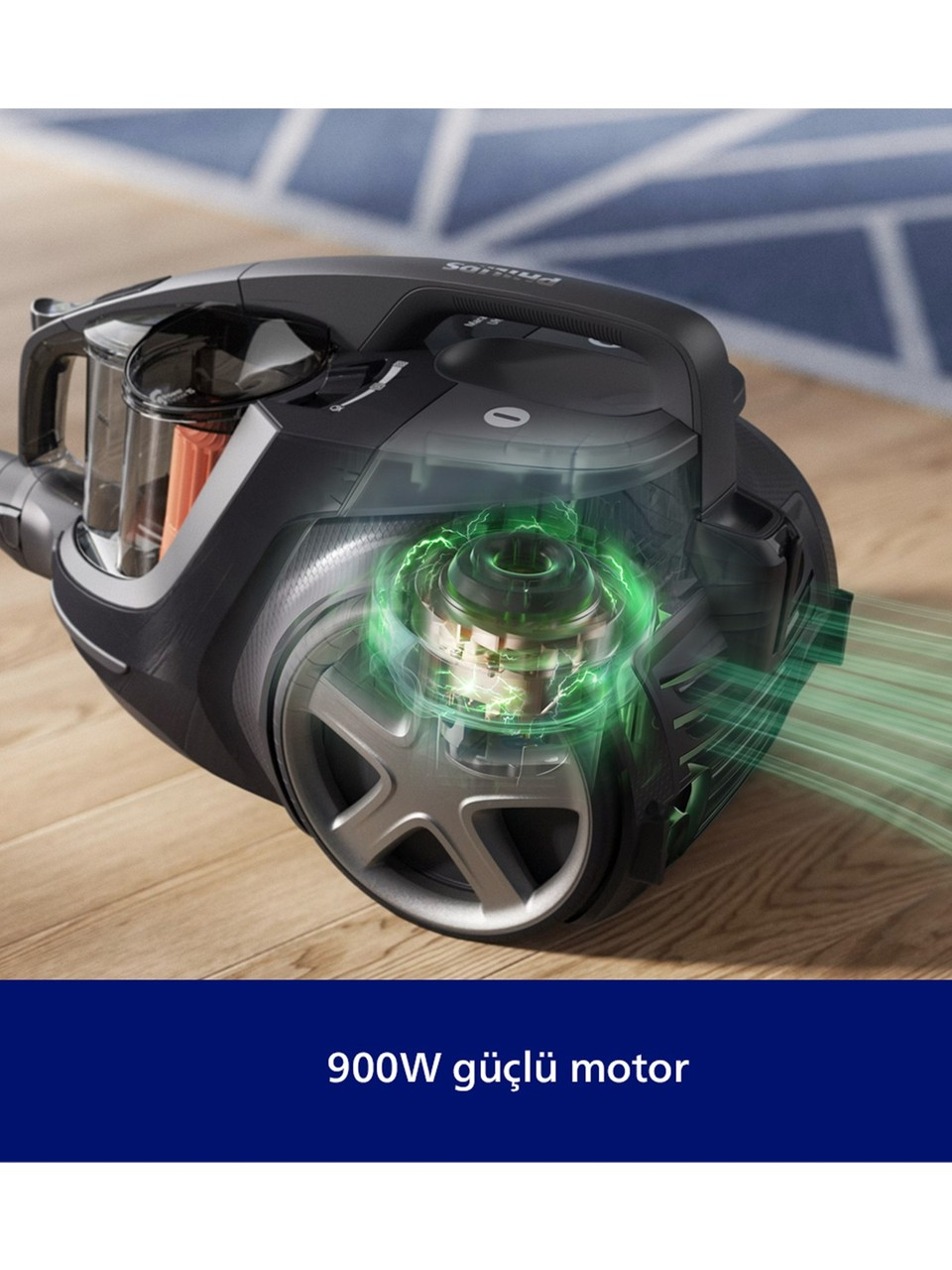 Ahşap zeminde dijital yeşil motor görselleştirmesine sahip siyah süpürge ve altta metin.