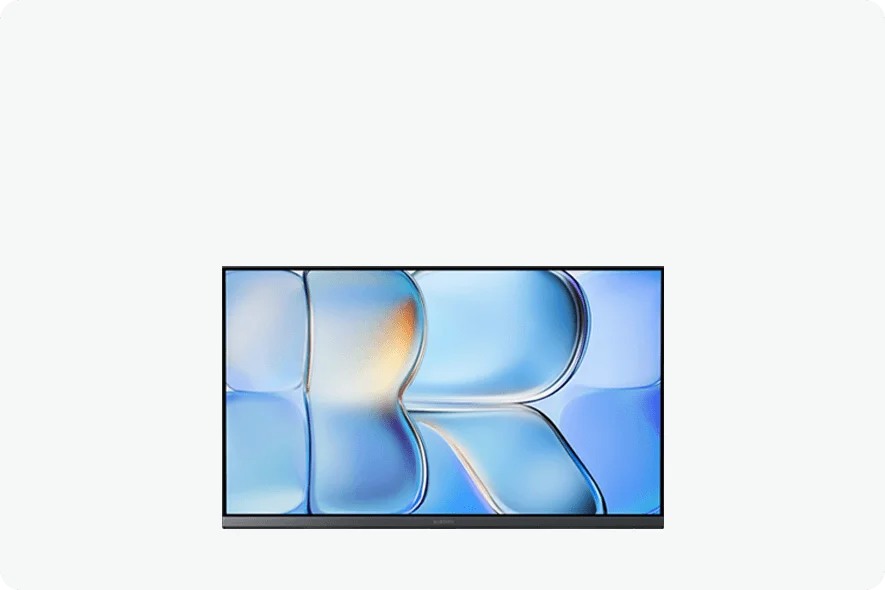 Egy televízió, amelyen kék absztrakt hullámminta látható a képernyőjén, világos háttér előtt.