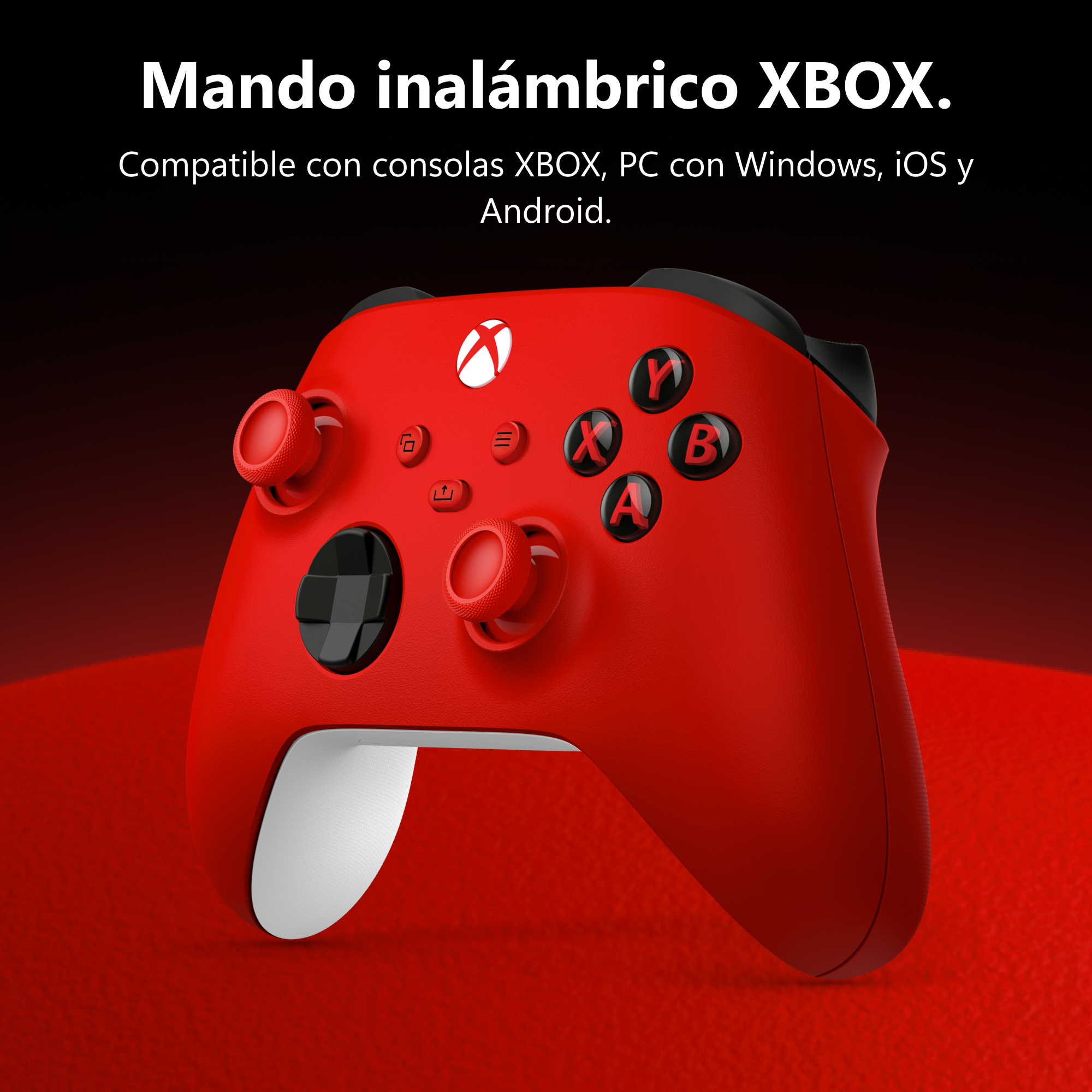 Un mando inalámbrico Xbox rojo con botones negros sobre una superficie roja.