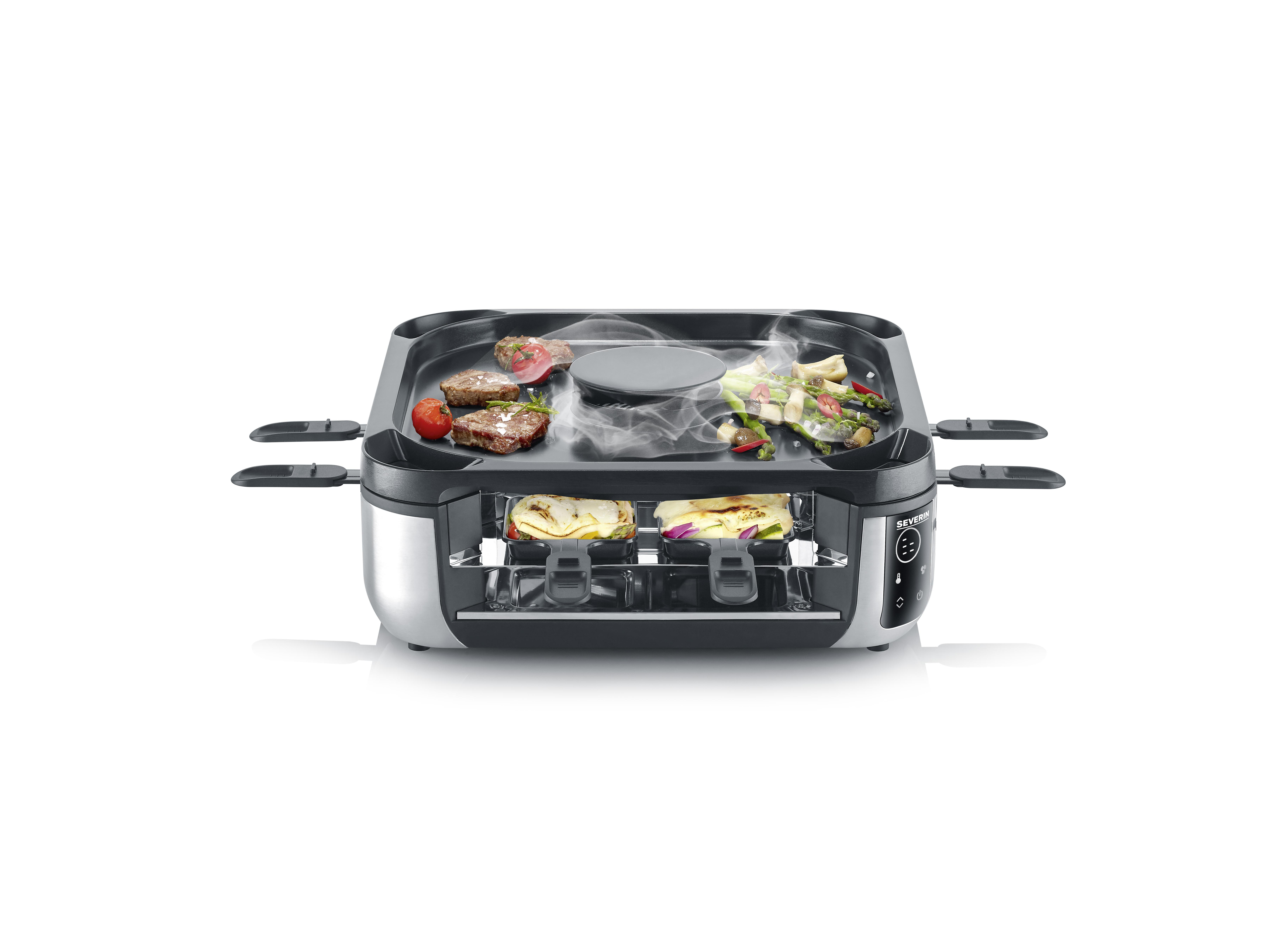 Ein rauchender Tischgrill mit Fleisch und Gemüse oben und Raclettepfännchen unten.