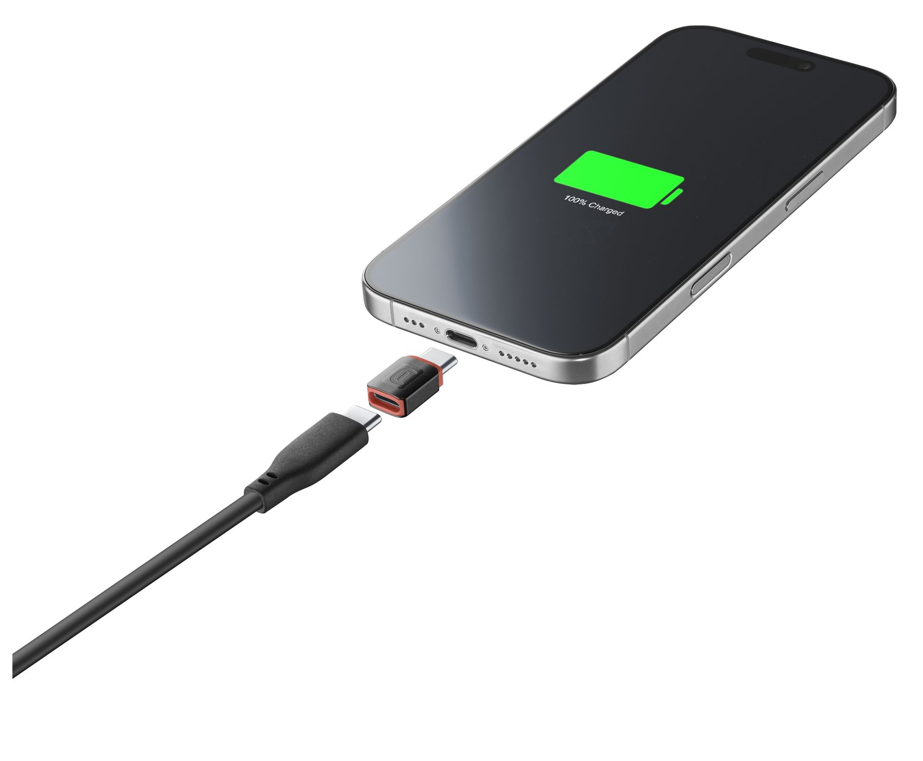 Un smartphone cargando, conectado mediante un cable USB-C y adaptador.