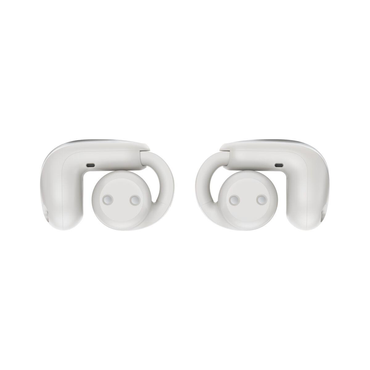 Zwei weiße Open-Ear-Ohrhörer im offenen Ringdesign nebeneinander auf weißem Hintergrund.