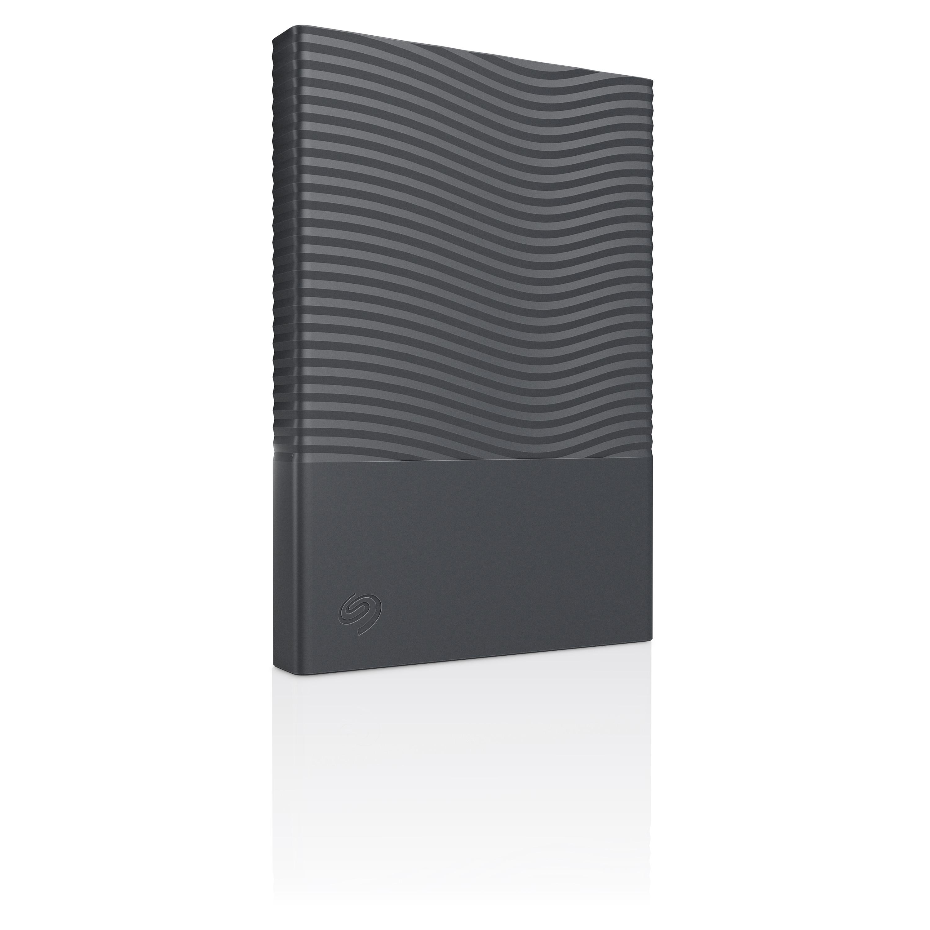 Graue externe Seagate-Festplatte mit wellenförmigem Muster und glattem unteren Bereich mit Logo auf weißem Hintergrund.