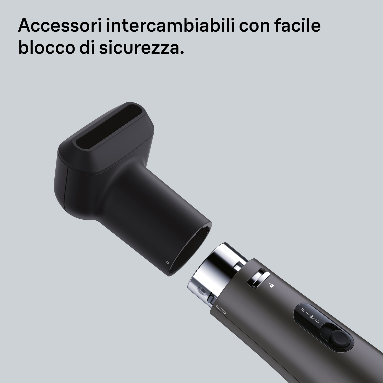 Accessorio intercambiabile sopra il corpo di un asciugacapelli grigio, con testo in alto.