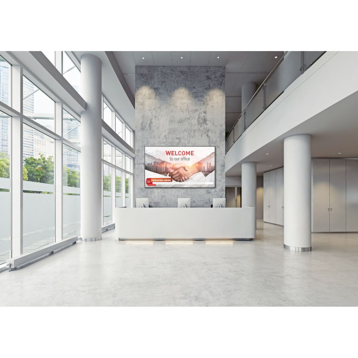 Modern bright lobby with reception desk and screen on a concrete wall.