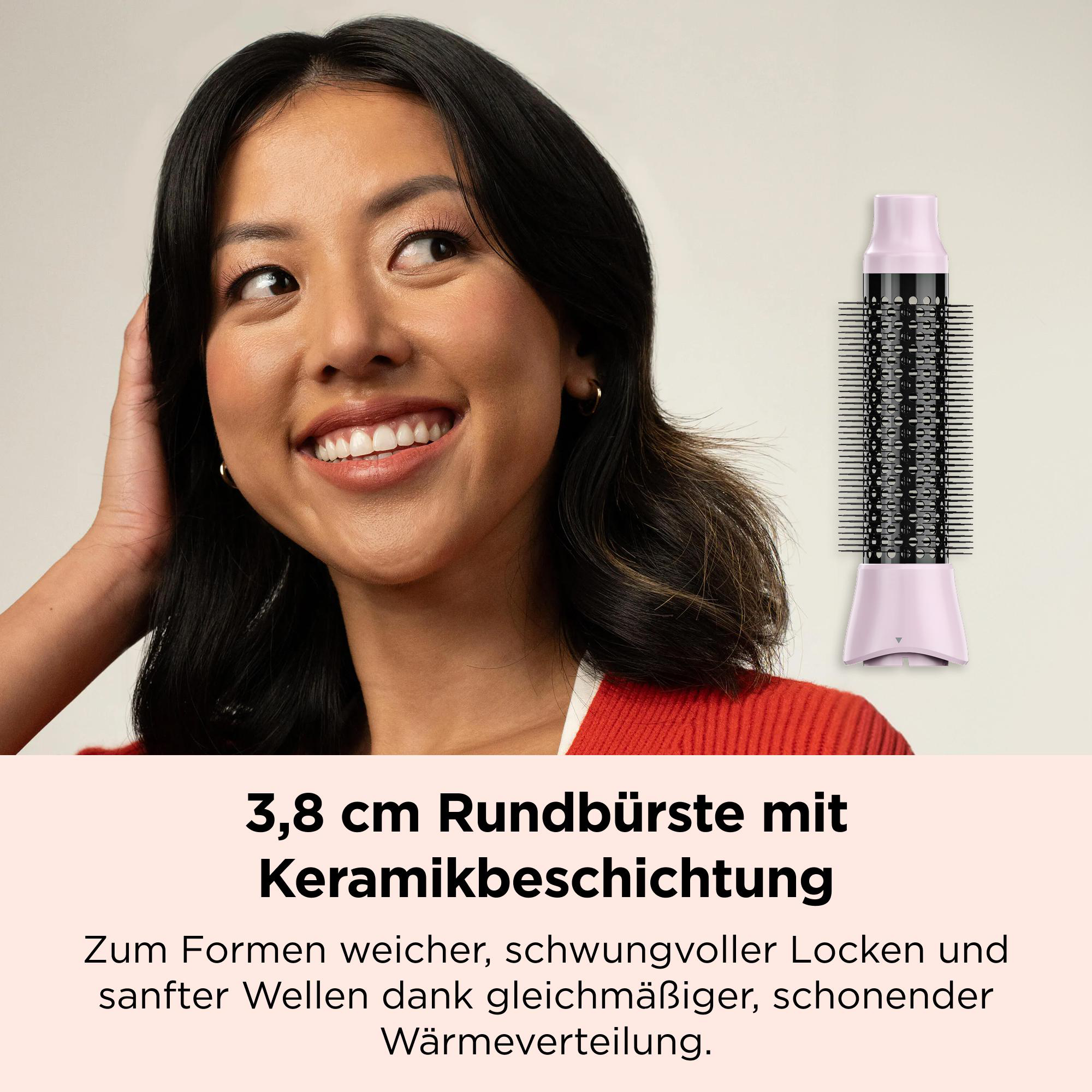 Lächelnte Frau in Rot neben einer rosa-schwarzen 3,8-cm-Rundbürste mit deutschem Text.