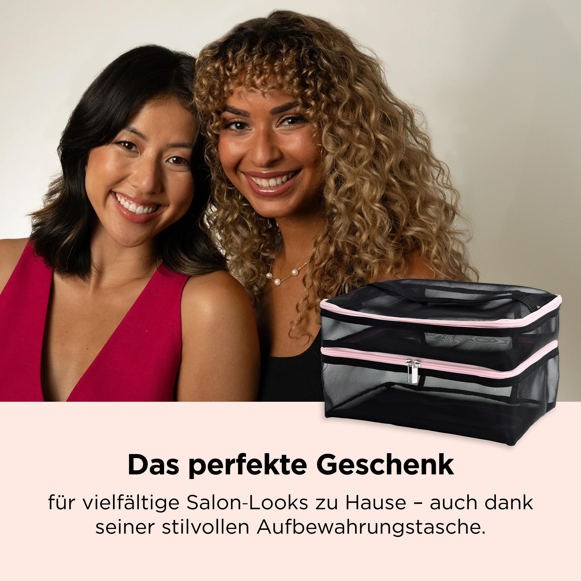Zwei lächelnde Frauen neben einer schwarzen Kosmetiktasche mit rosafarbenem Reißverschluss vor hellgrauem Hintergrund.