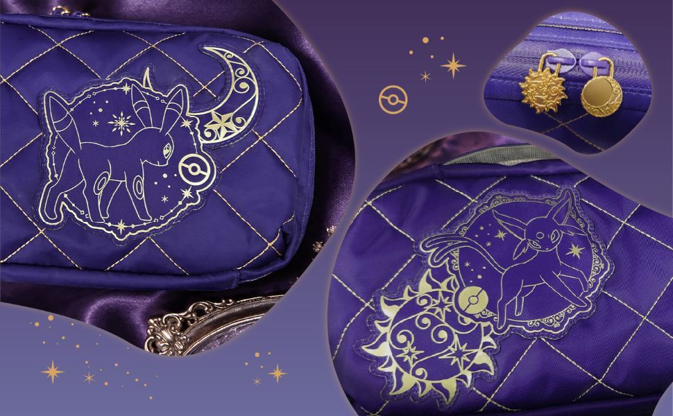 Pochette trapuntata viola con design dorato di Umbreon, stelle e cursori della zip sole e luna.