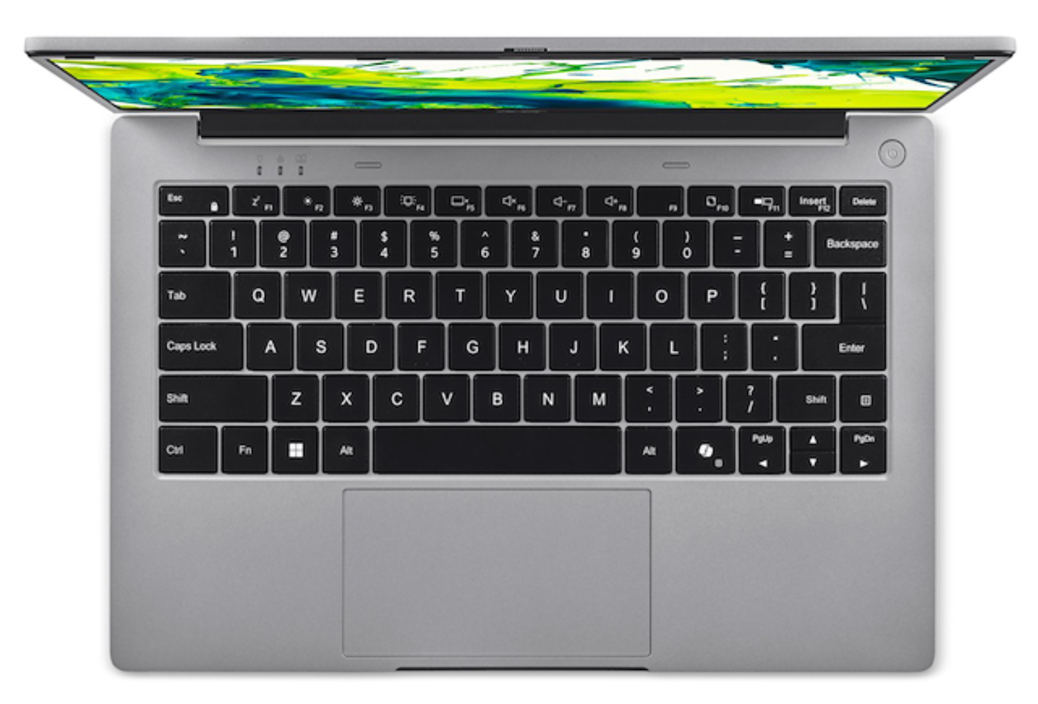 Vista superior de una computadora portátil plateada con teclado negro y panel táctil.