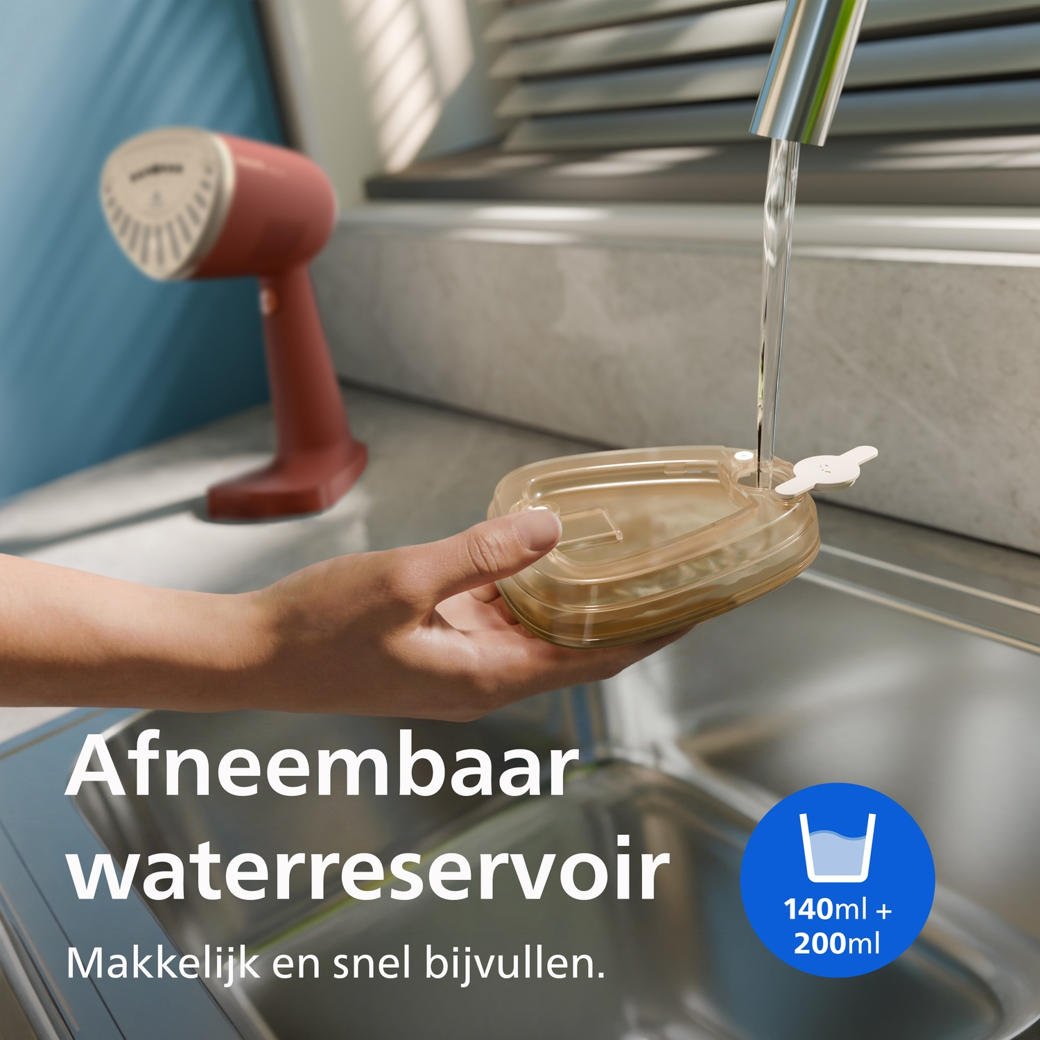 Hand filling removable water tank of red handheld garment steamer under faucet.