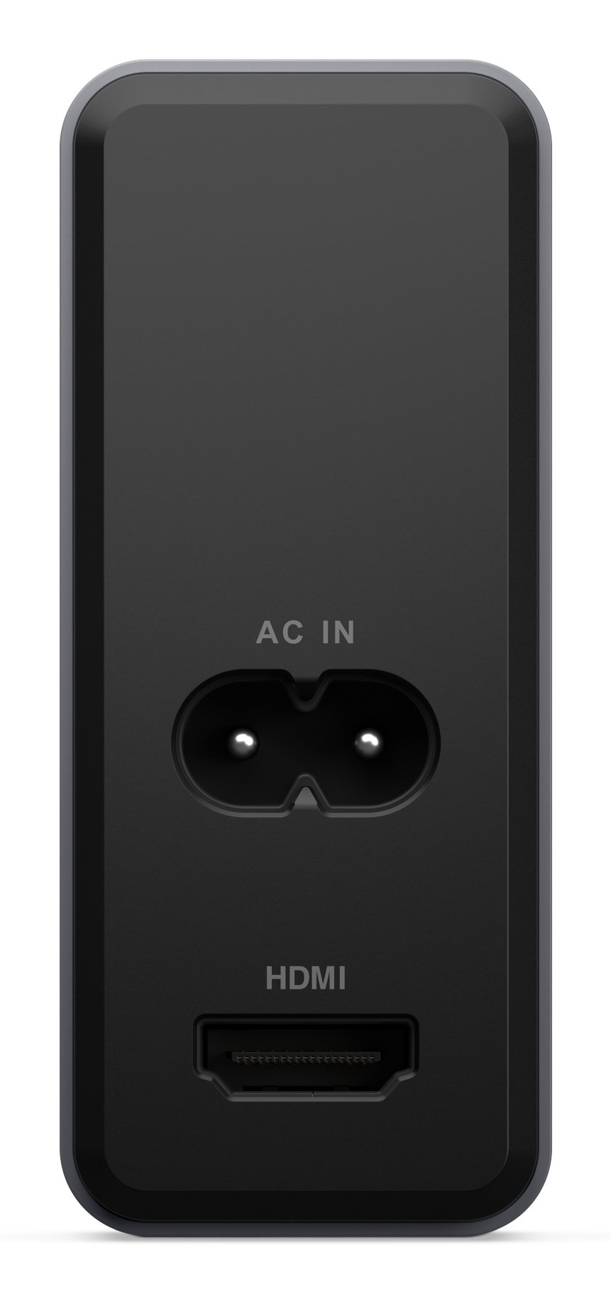 Vista trasera de un dispositivo electrónico negro con puertos AC IN y HDMI sobre fondo blanco.
