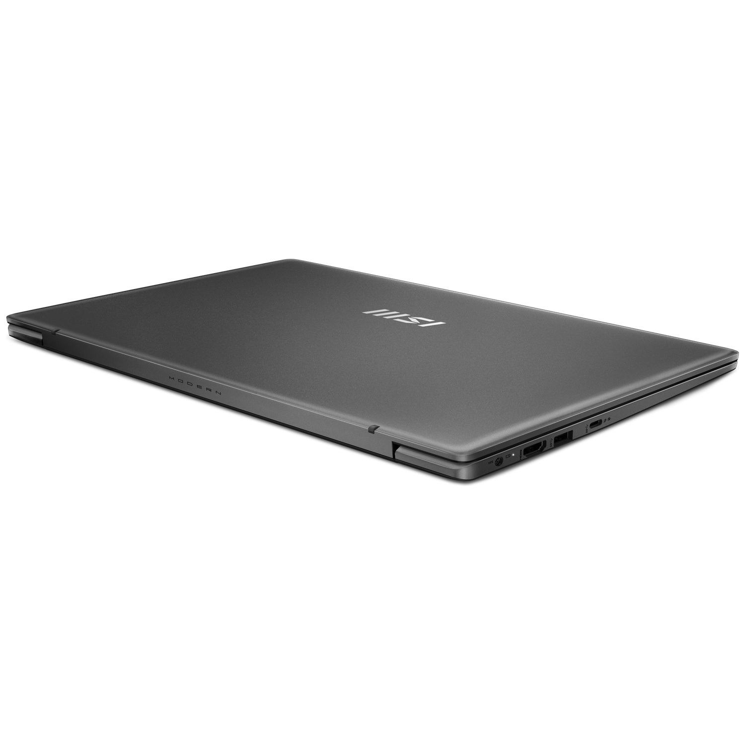 Un ordinateur portable MSI Modern gris foncé fermé sur fond blanc, vu de côté et de dos.