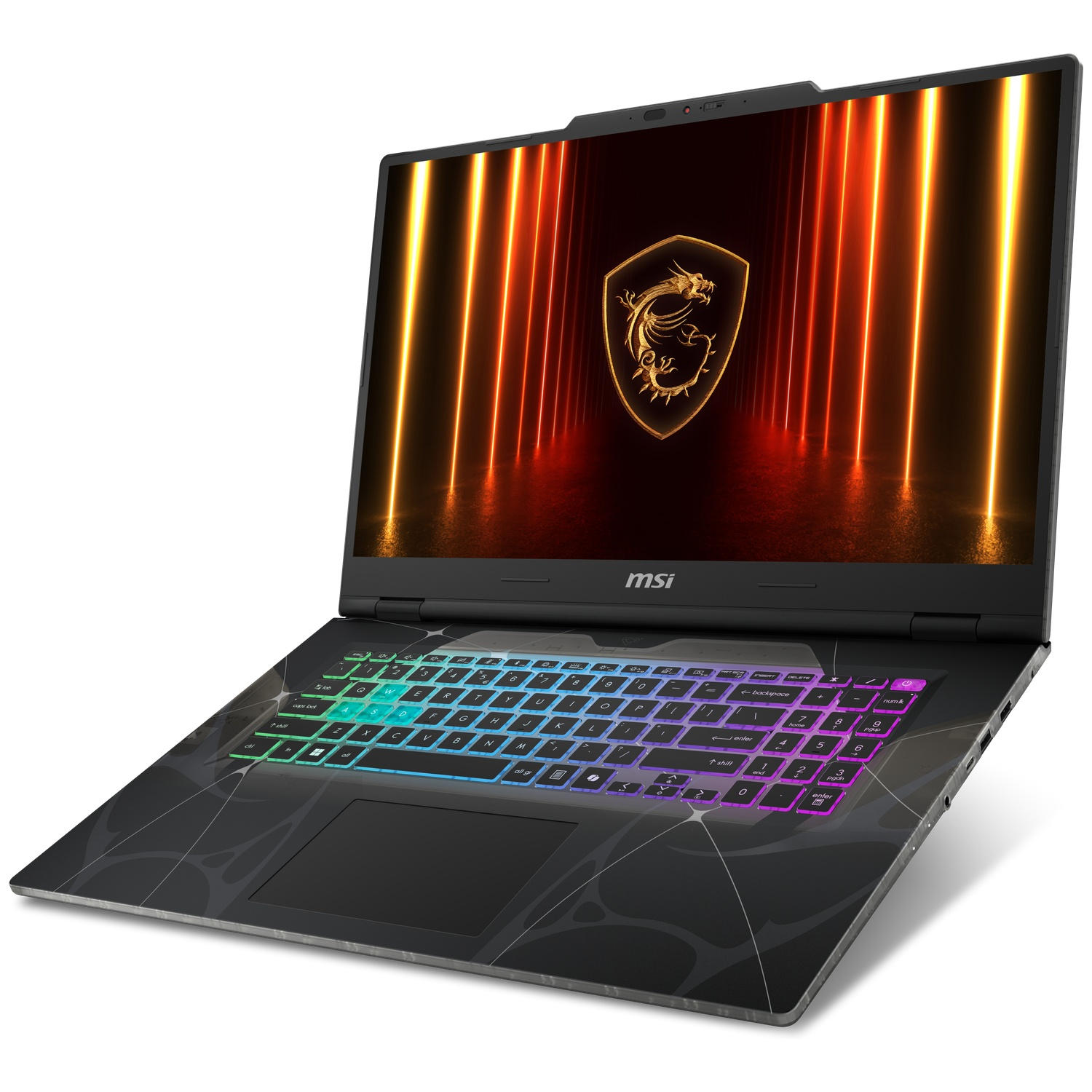 An open MSI laptop with a glowing keyboard and a golden dragon logo on screen against a red background.