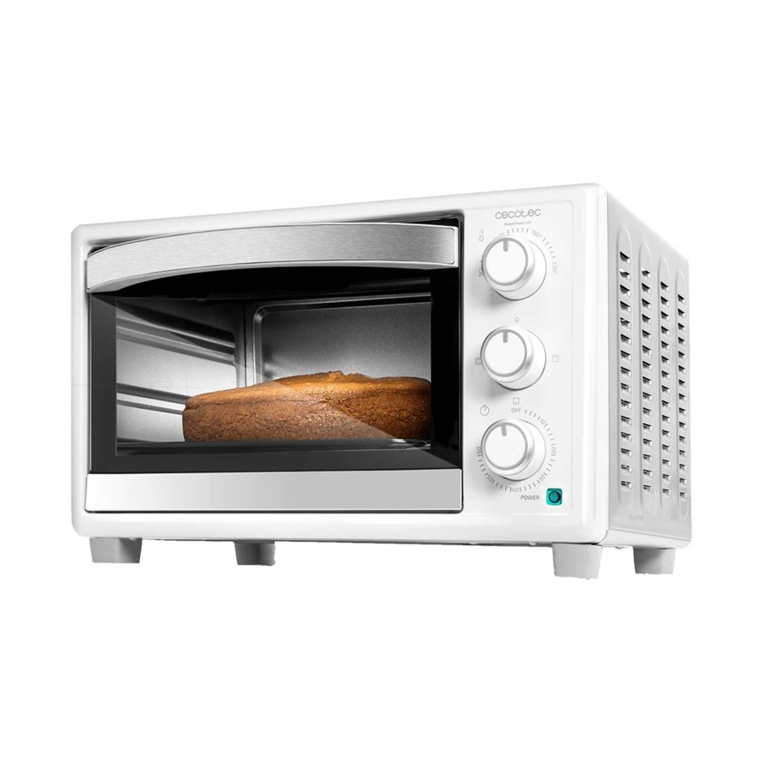 Un mini forno bianco con maniglia argentata, tre manopole e una torta in cottura all'interno.