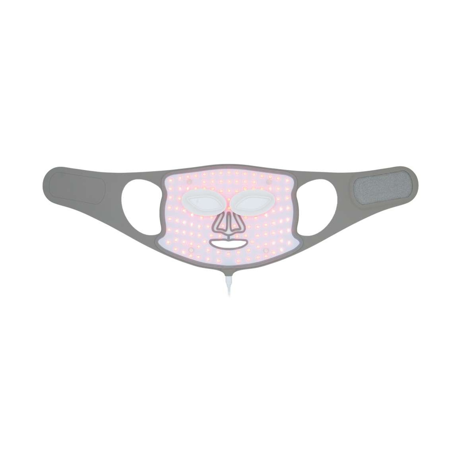 Una maschera facciale per cromoterapia a LED grigia con cinturini, illuminata con luce rosa, su sfondo bianco.