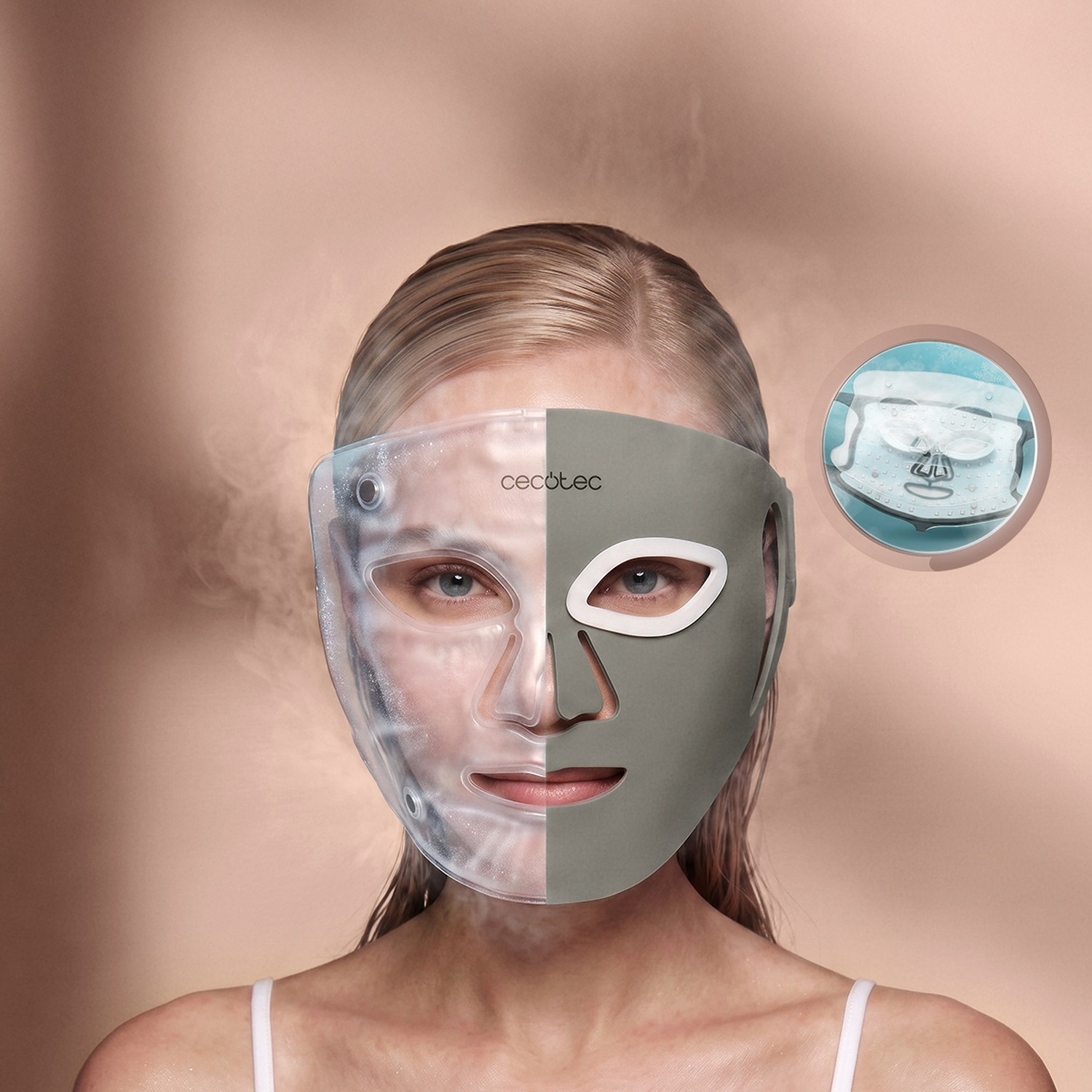 Una donna indossa una maschera divisa, metà trasparente e gelida, metà grigia, su sfondo caldo.