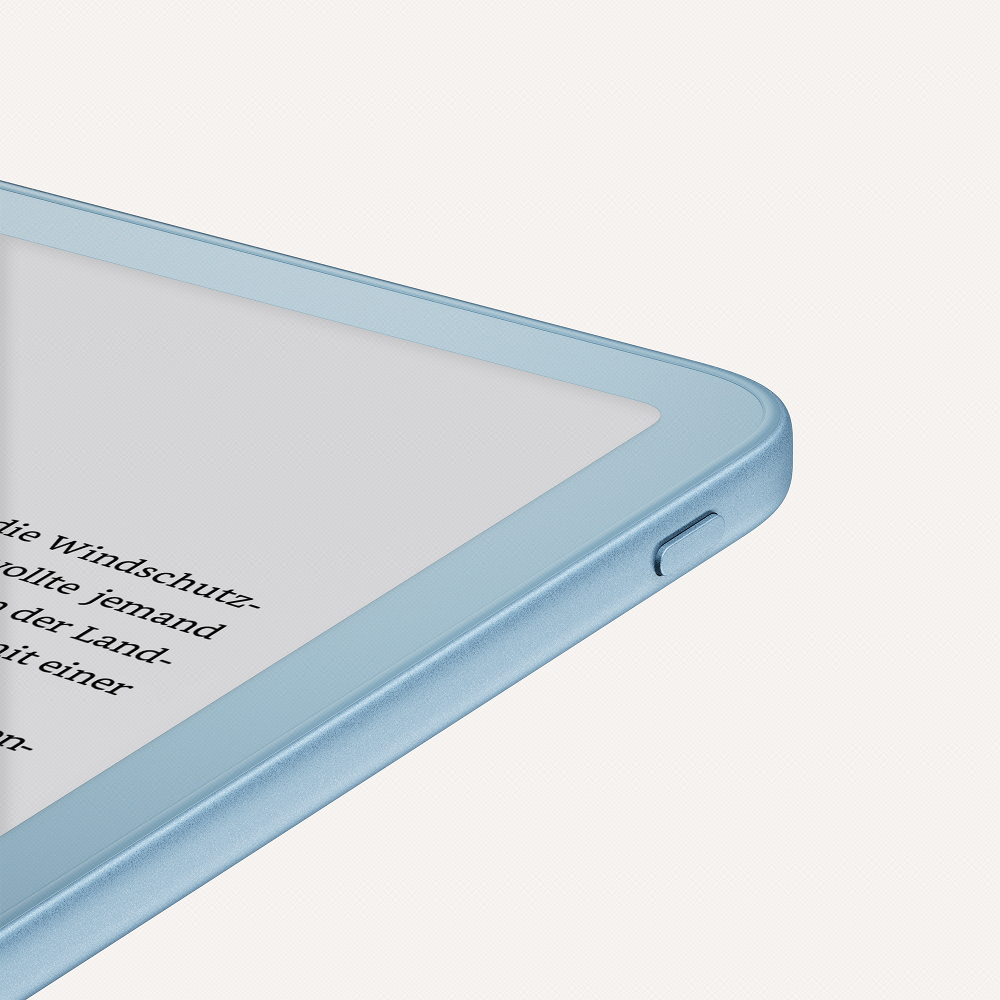Nahaufnahme der blauen Ecke eines E-Readers mit weißem Bildschirm und Text auf hellem Hintergrund.