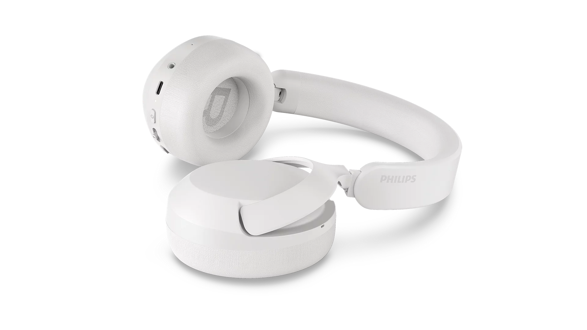 Beyaz arkaplanda beyaz Philips kulak üstü kulaklık.