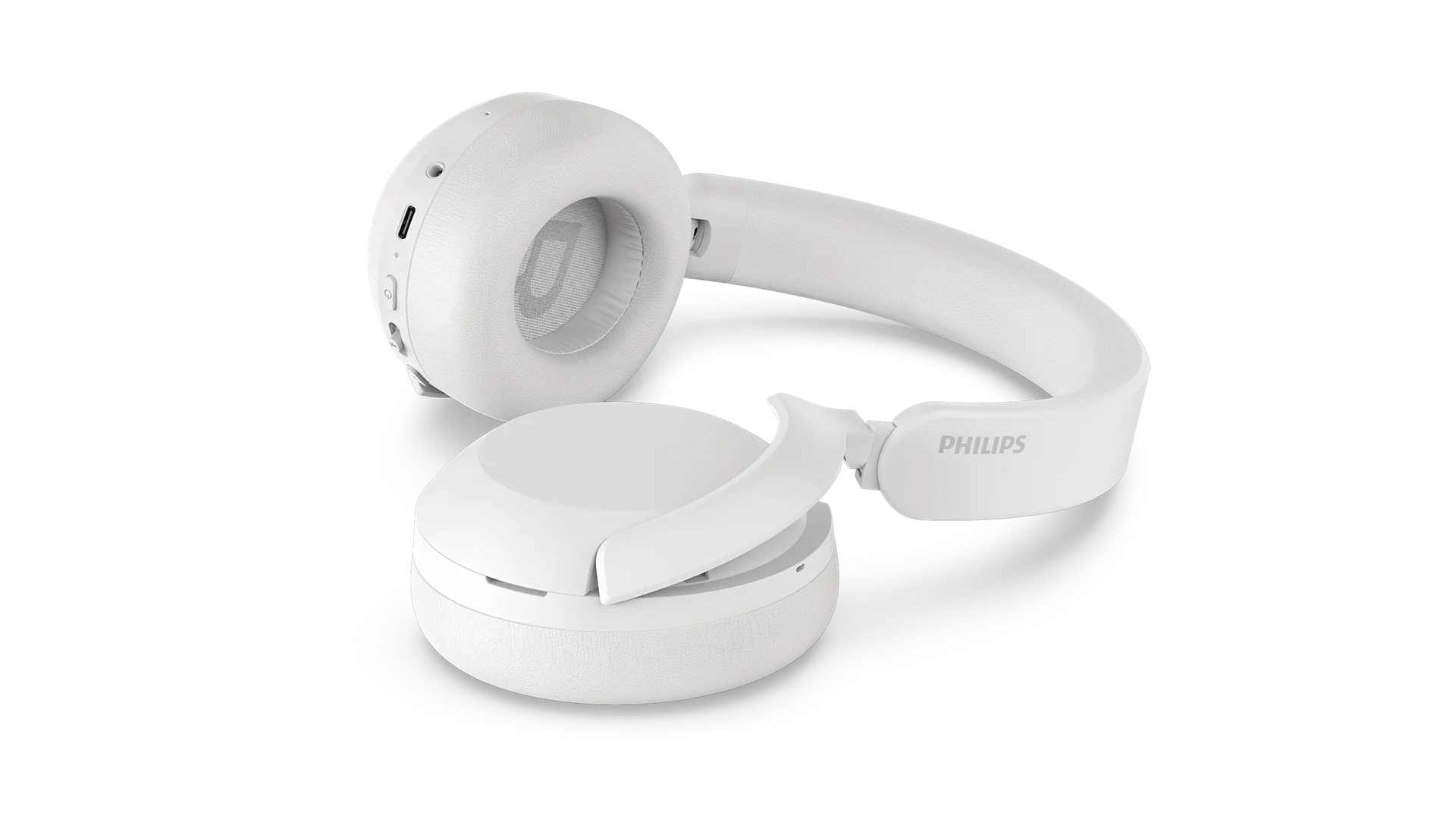 Beyaz arka planda beyaz Philips kablosuz kulak üstü kulaklık.
