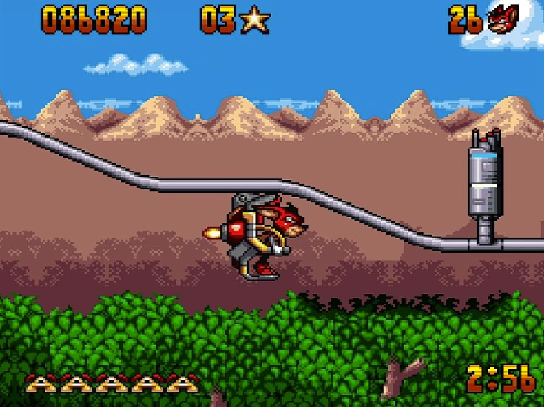 Eine Pixel-Art-Szene zeigt eine rote Kreatur mit Jetpack unter einem Metallrohr vor einer Bergkulisse.