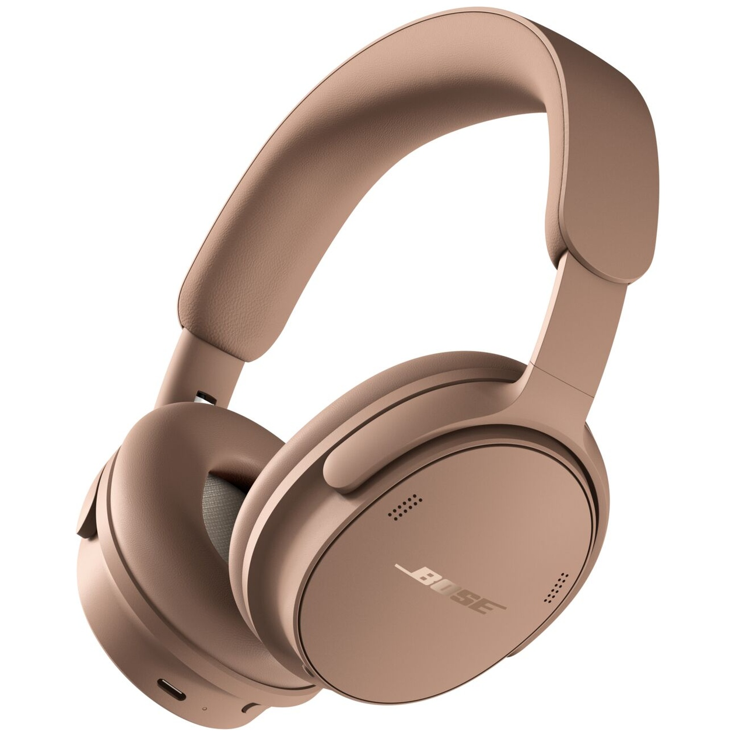 Beige Bose over-ear headphones with a cushioned headband and ear cups on a white background.