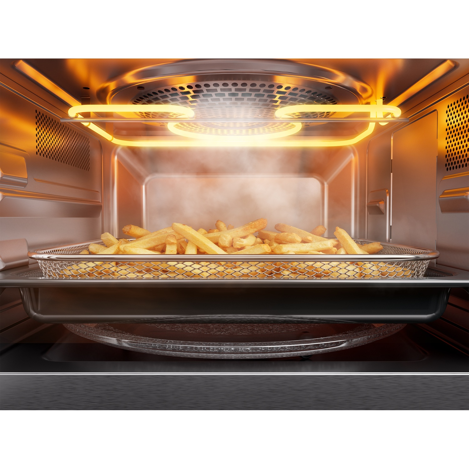 Golden french fries in a metal mesh basket inside a brightly lit oven with glowing heating elements.