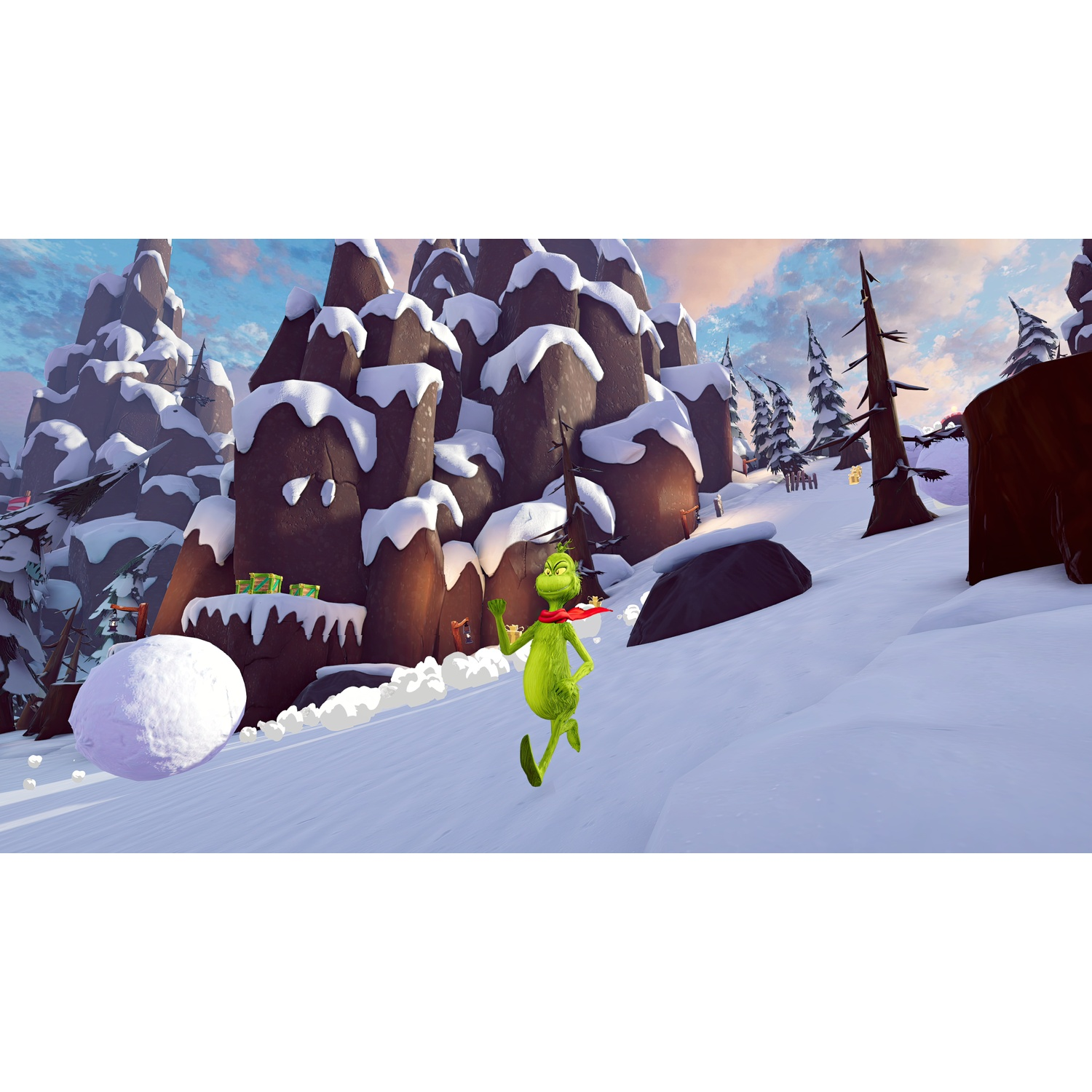 The Grinch runs in the snow before a mountain backdrop.
