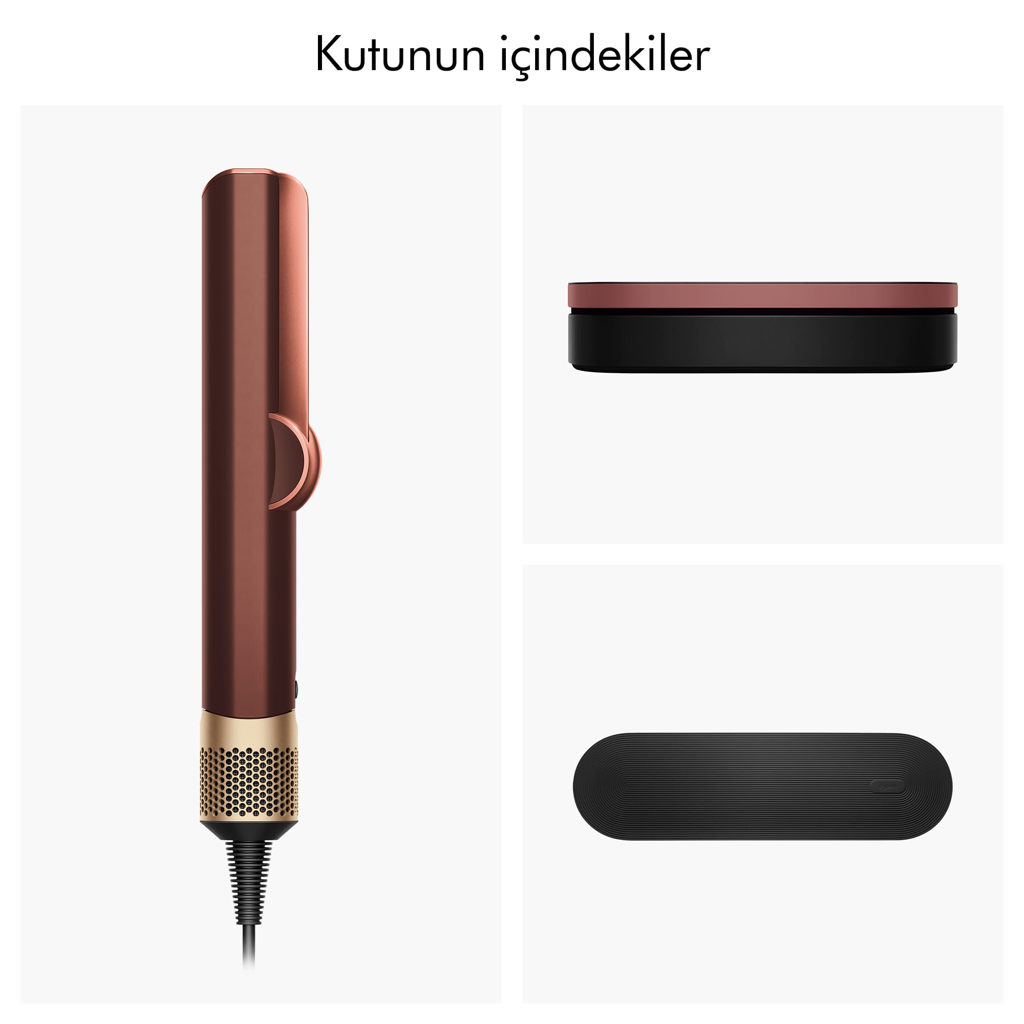 Beyaz arkaplanda aksesuarlarıyla birlikte bakır ve altın renkli saç şekillendirici.