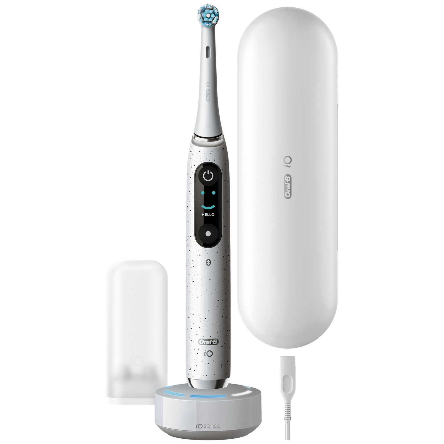 White Oral-B iO electric toothbrush with charging base, travel case, and accessories on white background.