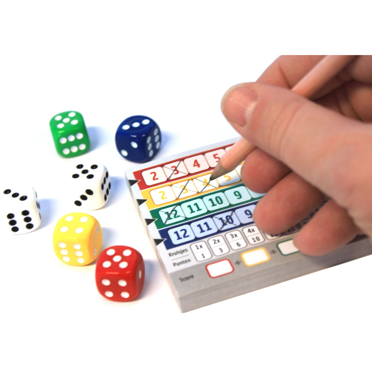 A hand writes on a colorful dice game sheet with a pencil, surrounded by colorful dice.