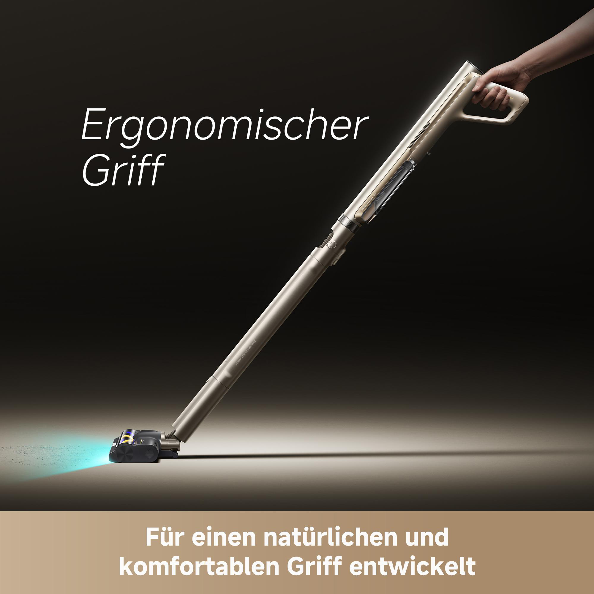 Hand hält einen modernen goldenen Akustaubsauger mit blauer Bodenbeleuchtung und deutschem Werbetext.