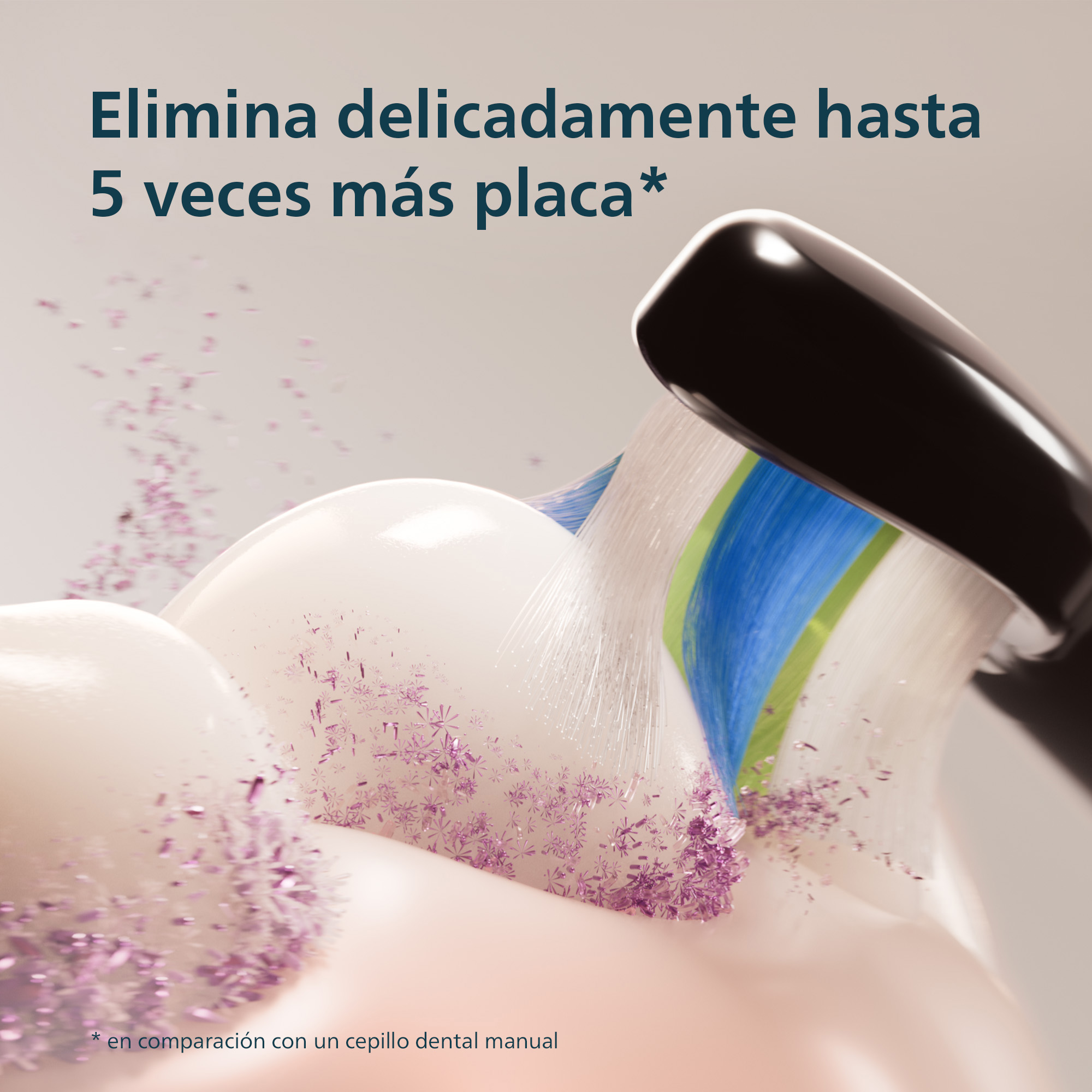 Un cabezal de cepillo eléctrico negro eliminando partículas de placa rosa.