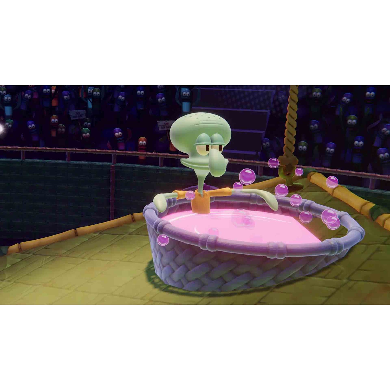 Squidward sits in a round tub with pink foam, surrounded by floating bubbles in an arena.