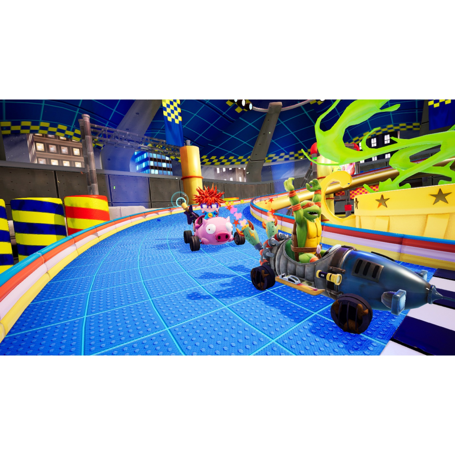 A ninja turtle drives a blue rocket kart on a blue track, followed by a character in a pink pig kart.