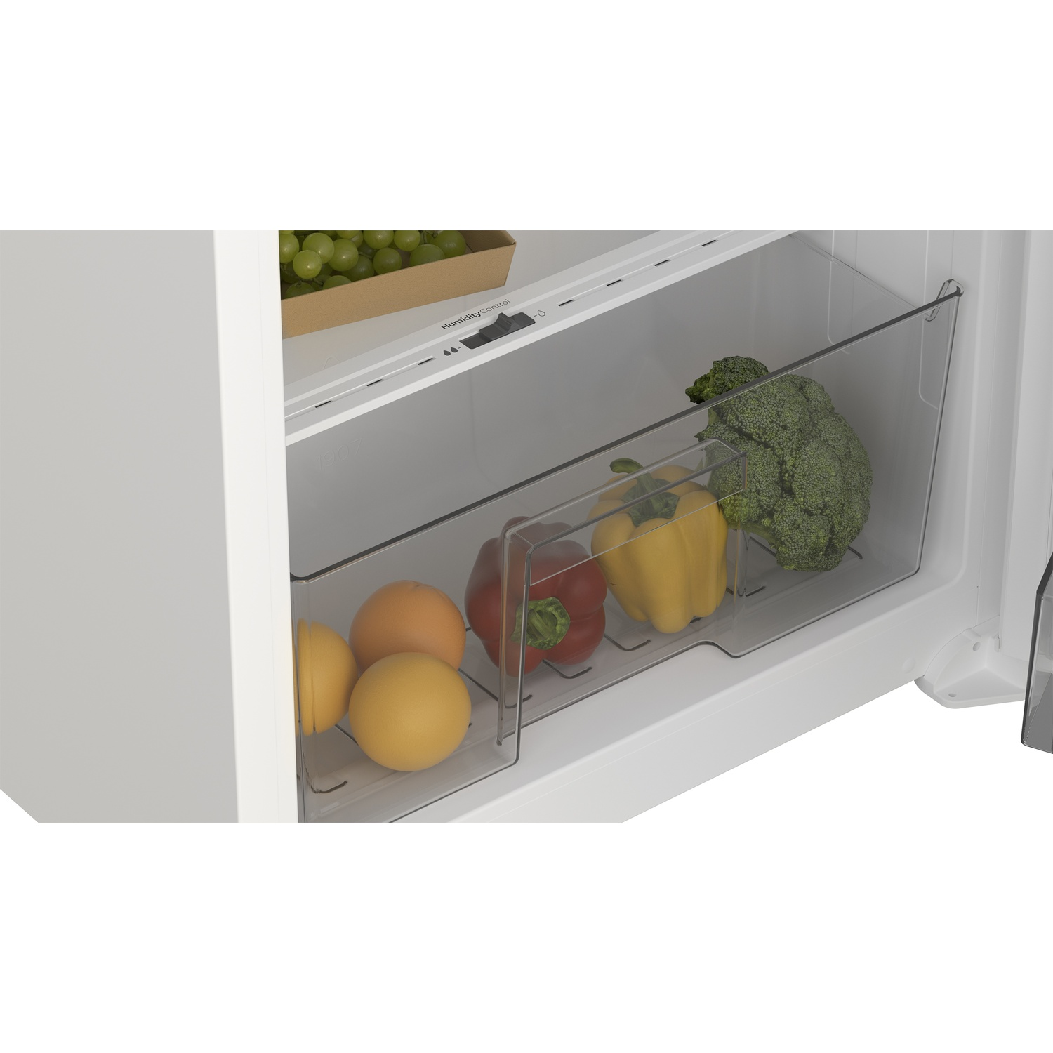 An open refrigerator drawer contains oranges, peppers, and broccoli in transparent bins.