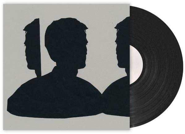 Eine Vinyl-Schallplatte mit einem grauen Cover, das schwarze Silhouetten von Männerköpfen zeigt.
