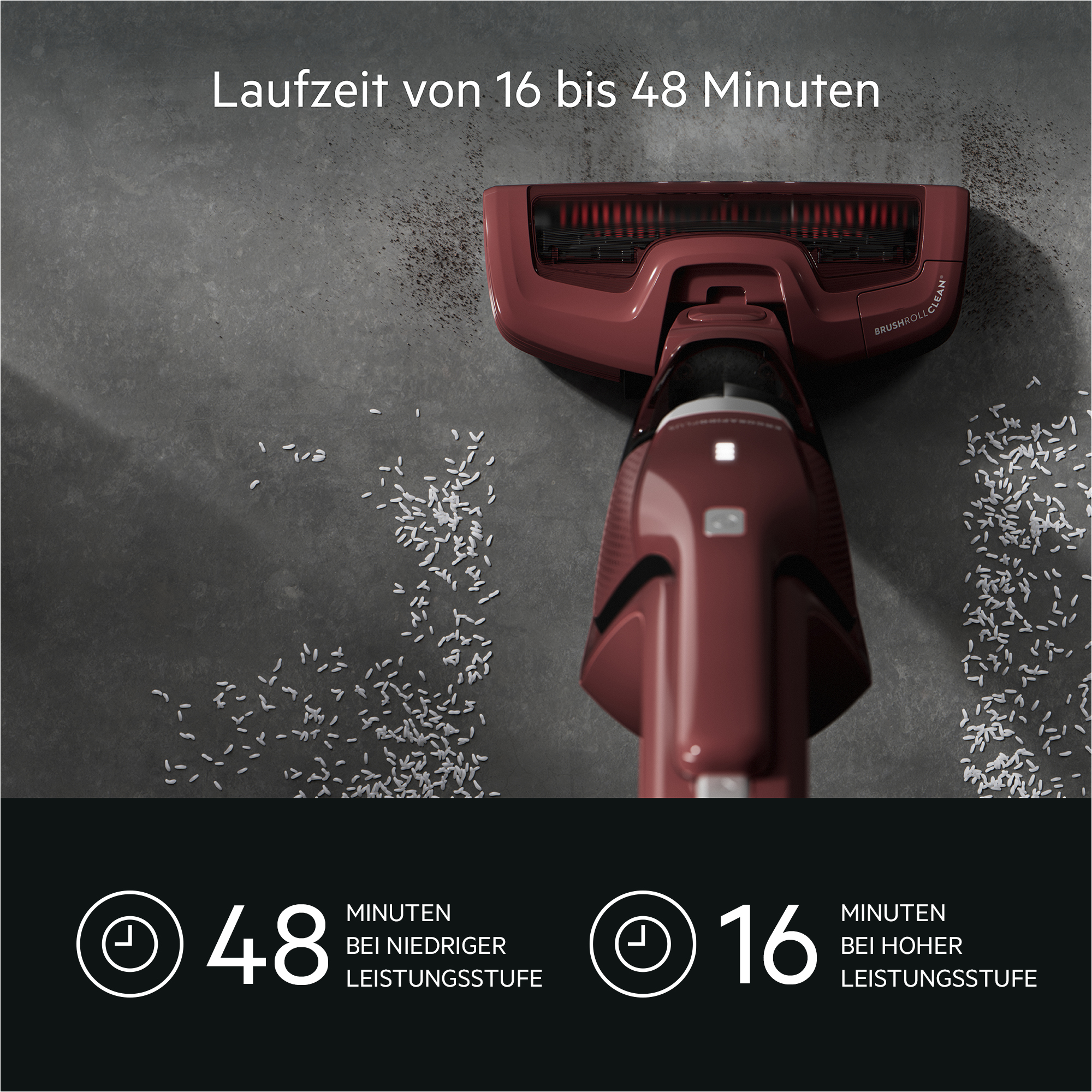 Ein roter Staubsauger reinigt einen grauen Boden mit Reiskörnern und Schmutz. Unten Text zur Akkulaufzeit.