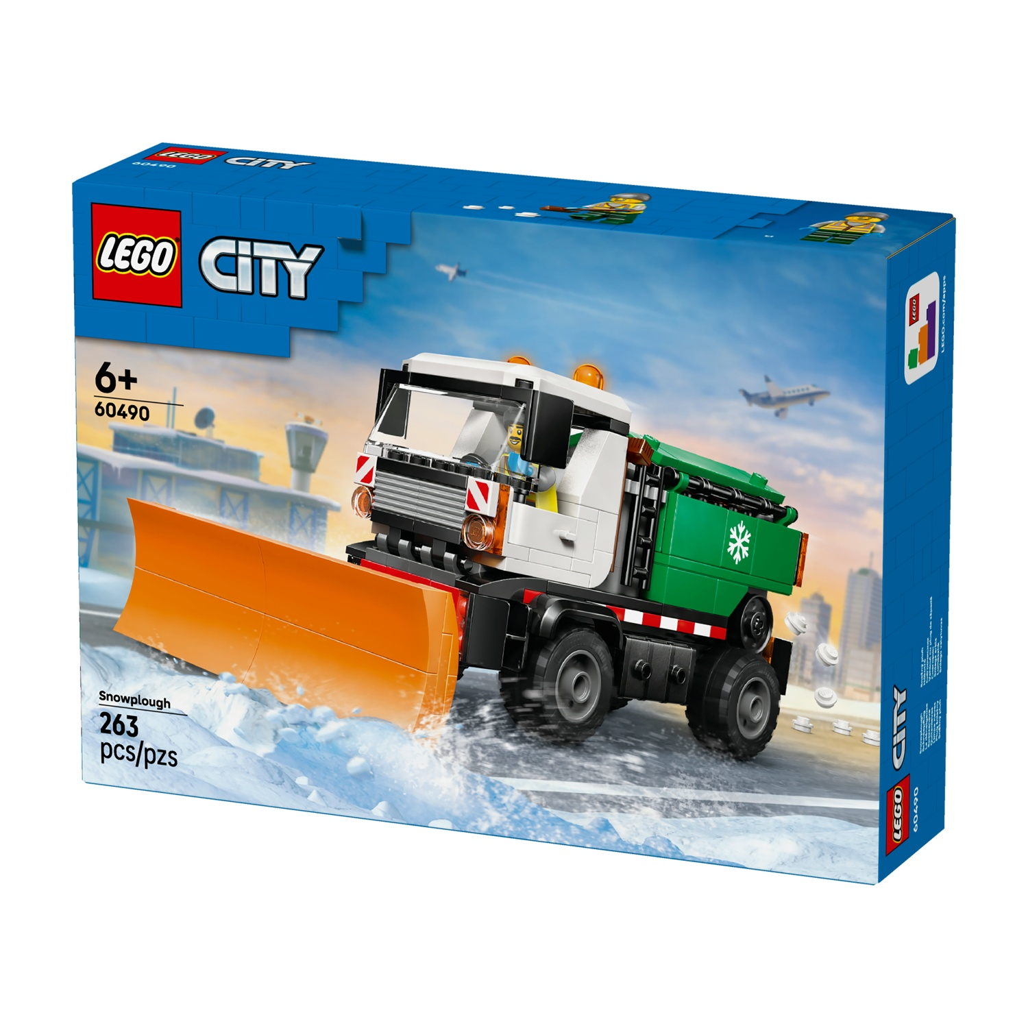 Scatola Lego City Spaneve con camion bianco e verde dotato di lama arancione sulla neve.