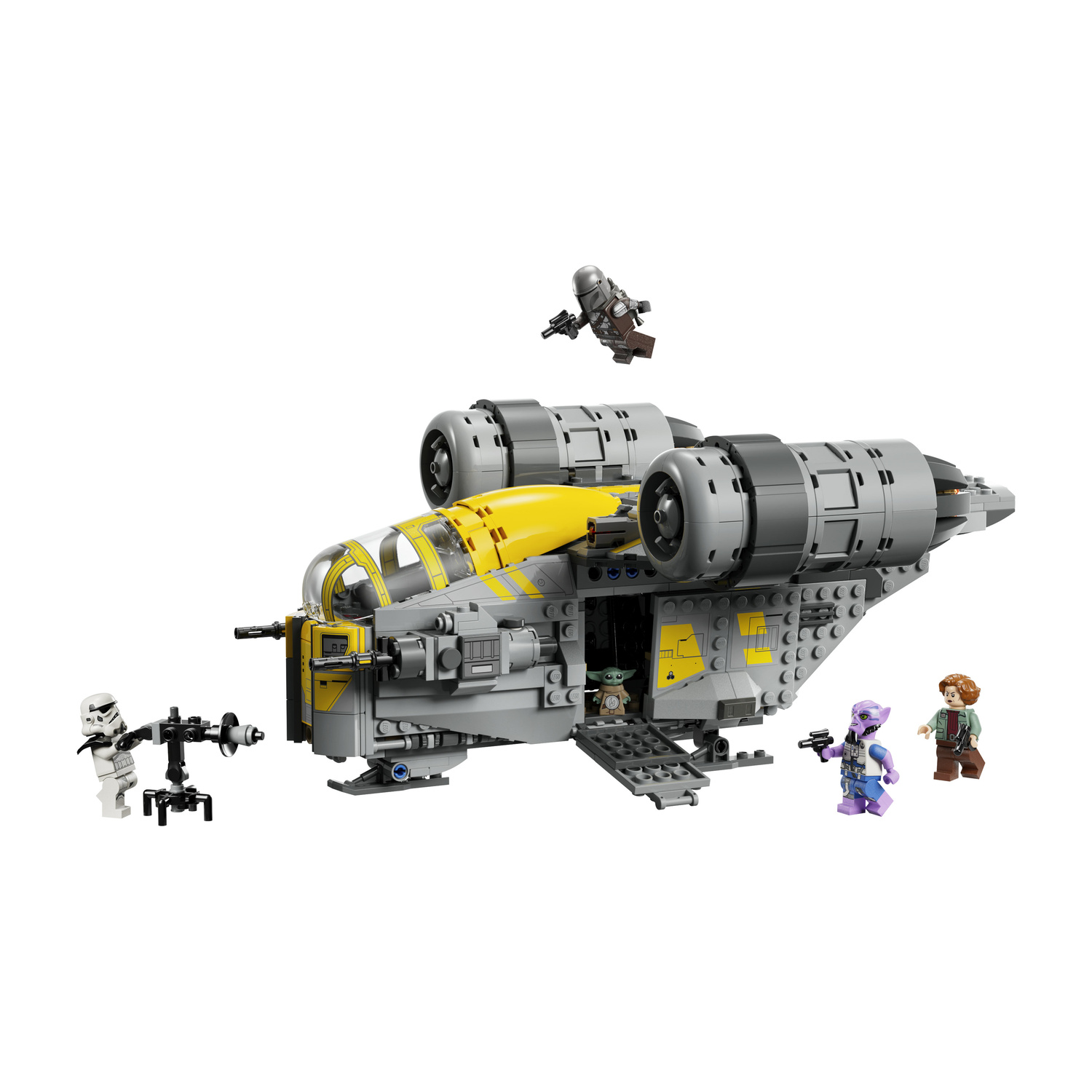 Astronave Lego grigia e gialla con minifigure tra cui uno stormtrooper e Yoda.