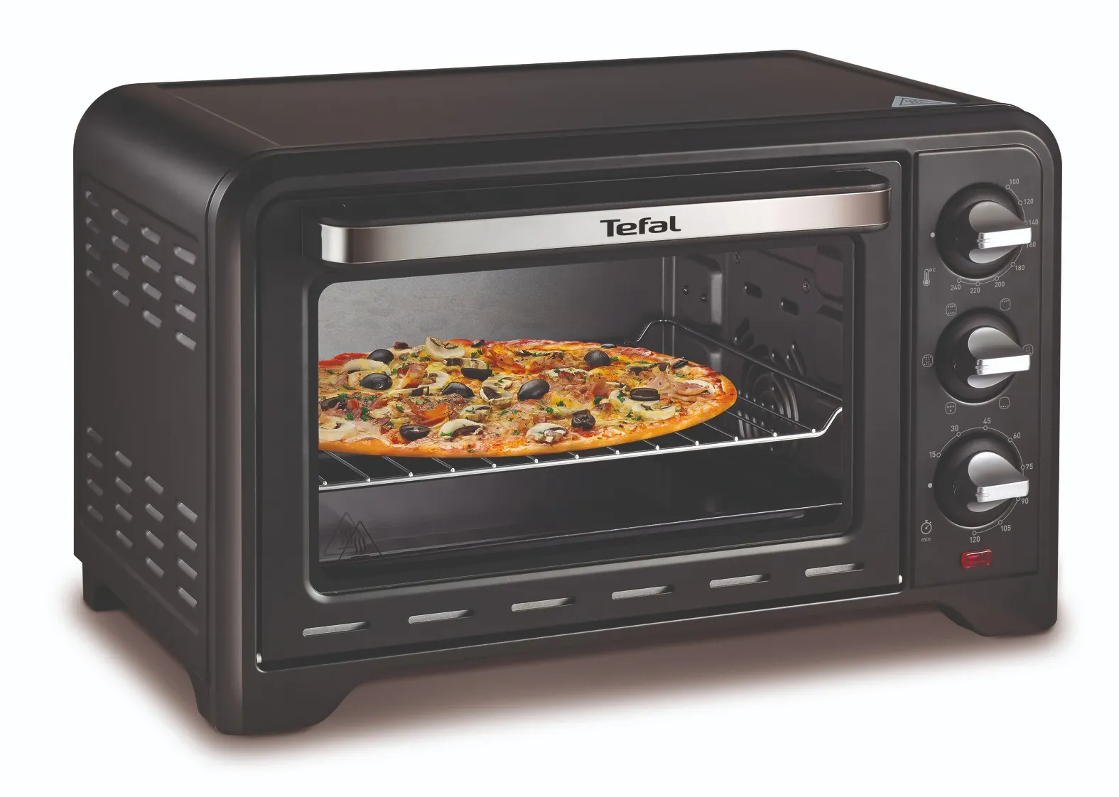 Fekete Tefal mini sütő rácson sült pizzával és három forgatógombbal az oldalán.