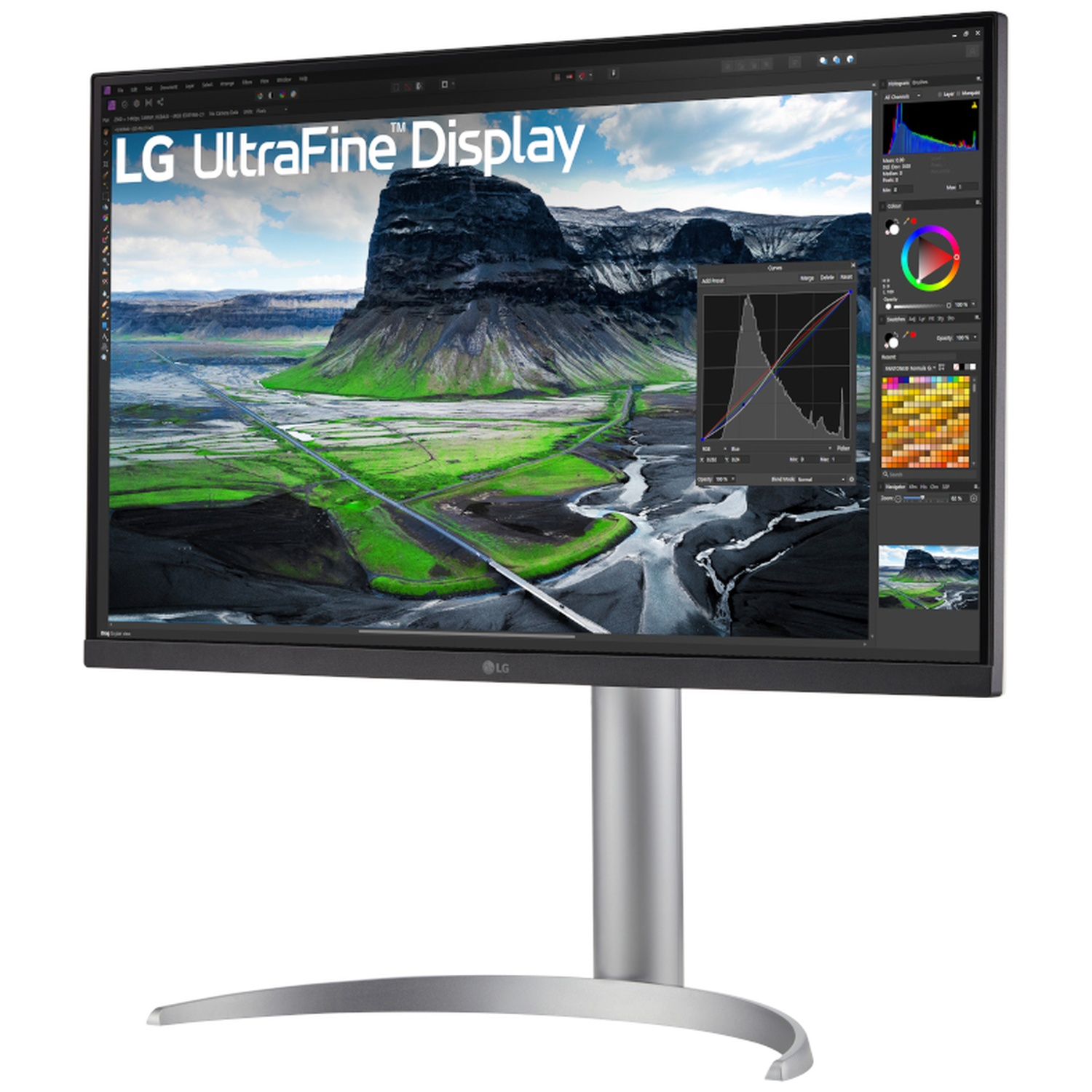 LG UltraFine Display showing a mountain screensaver and editing panels on a silver stand.