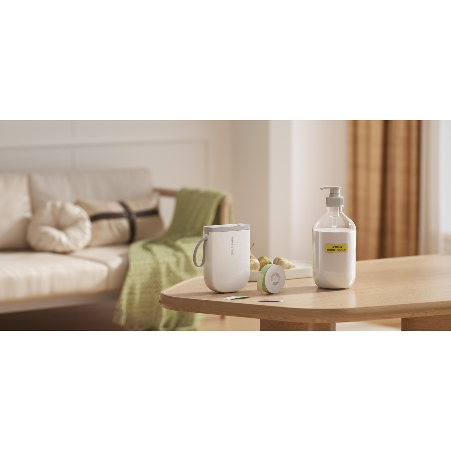 A small white label printer and dispenser bottle sit on a wooden table in a brightly lit living room.