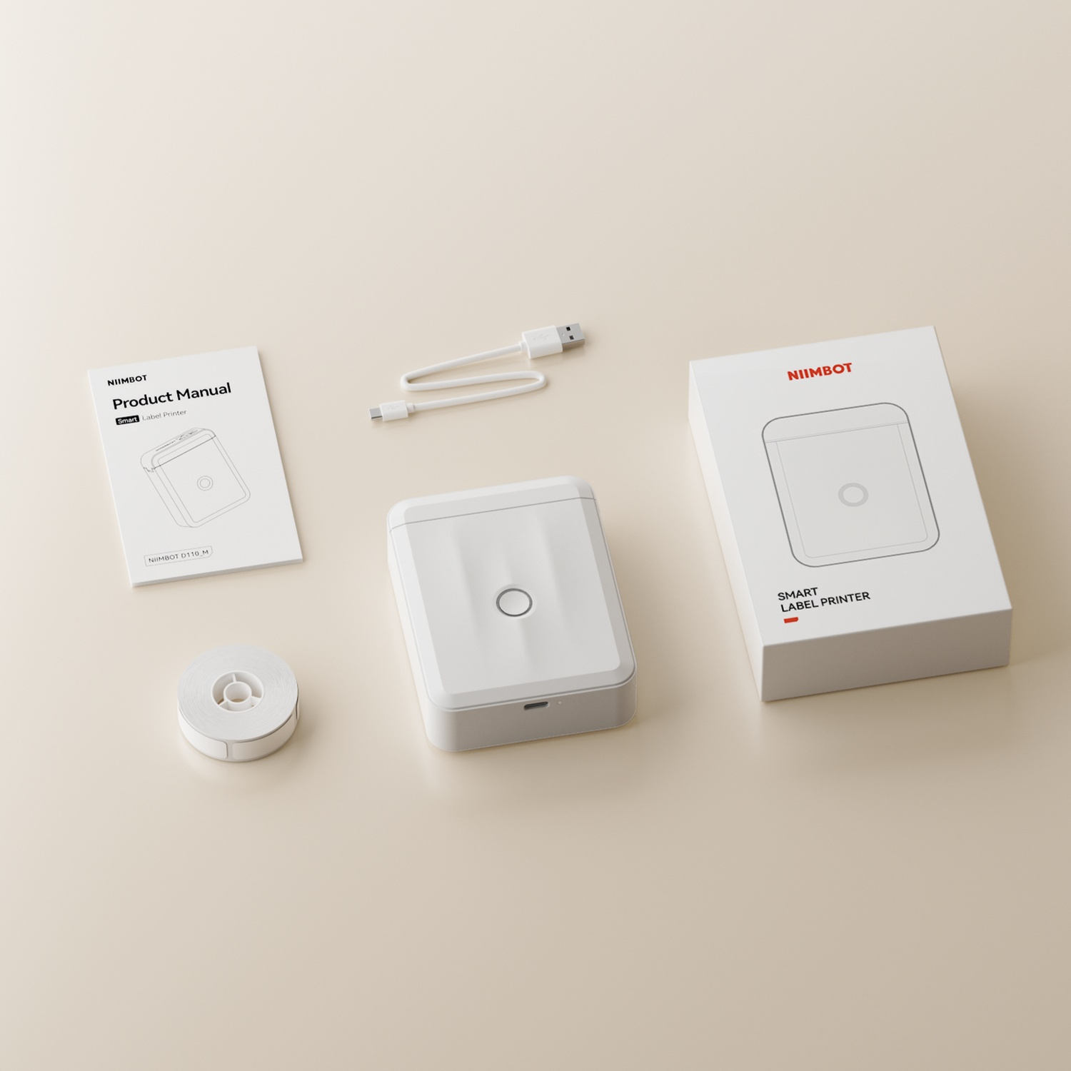 A white Niimbot label printer with packaging, manual, cable, and label roll on a neutral background.