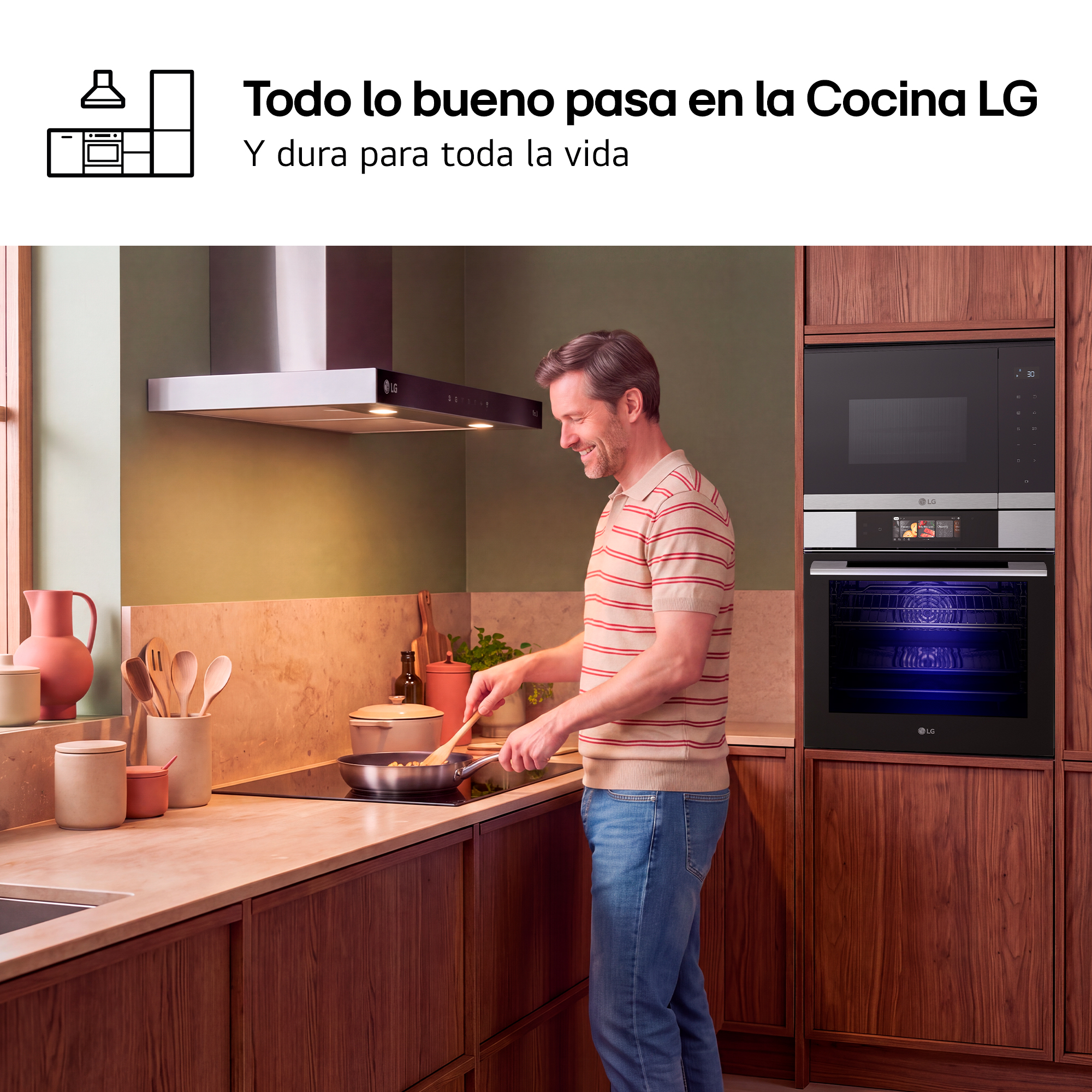 Un hombre cocina en una cocina de madera moderna en una estufa de inducción con horno.
