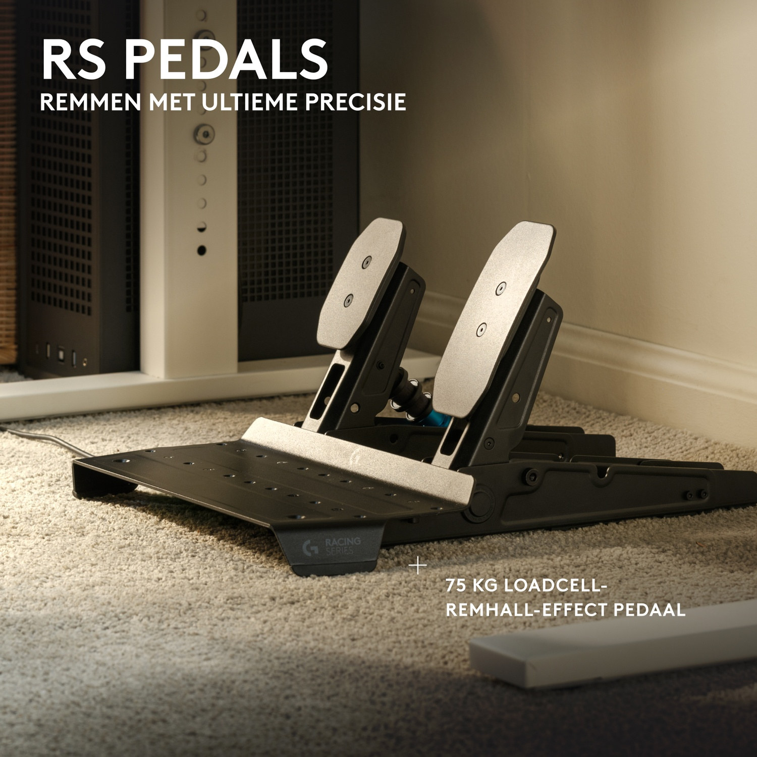 Black RS racing pedals on a carpeted floor in front of a PC case with text.
