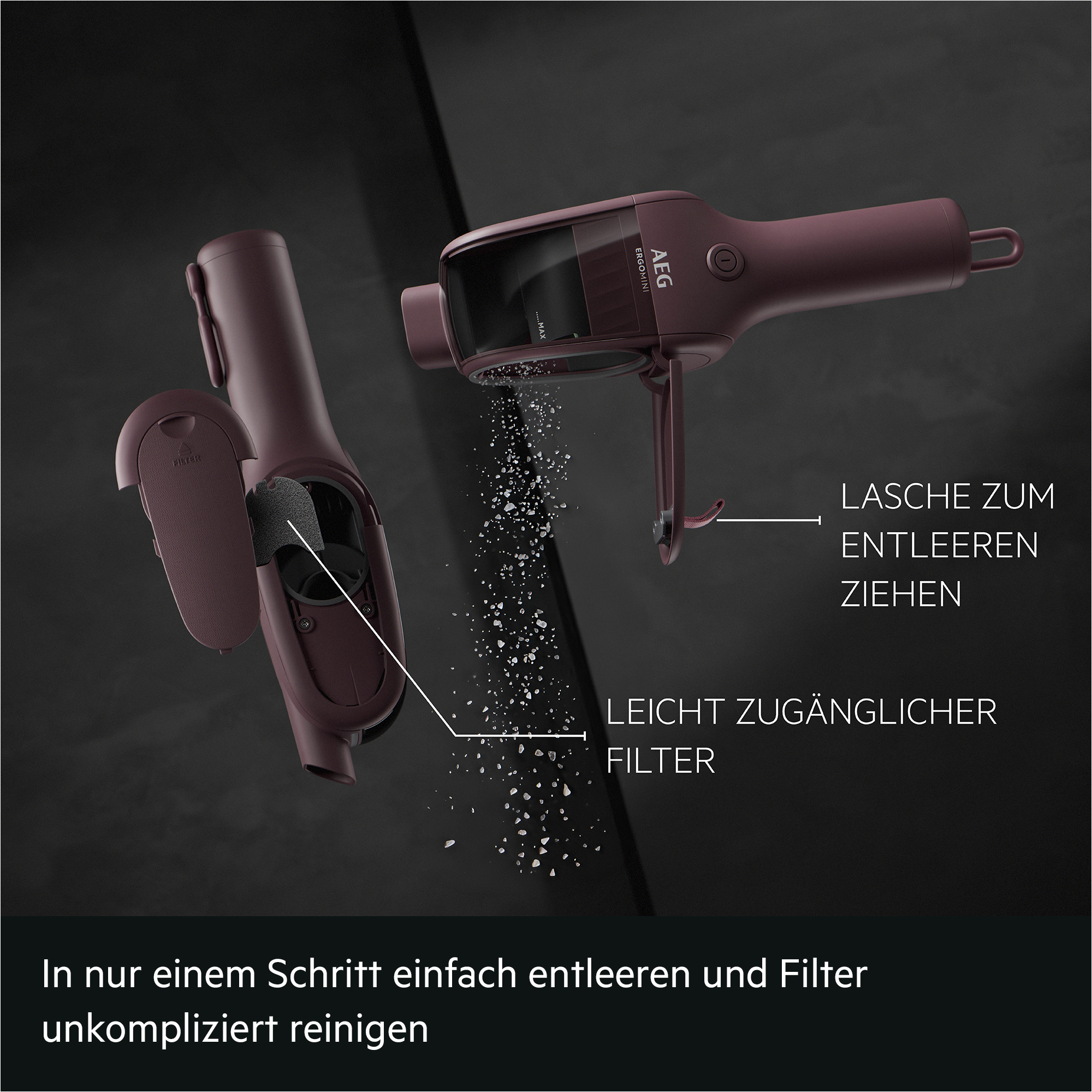 Roter Handstaubsauger mit geöffnetem Staubbehälter, der Salz verschüttet, und zugänglichem Filter.